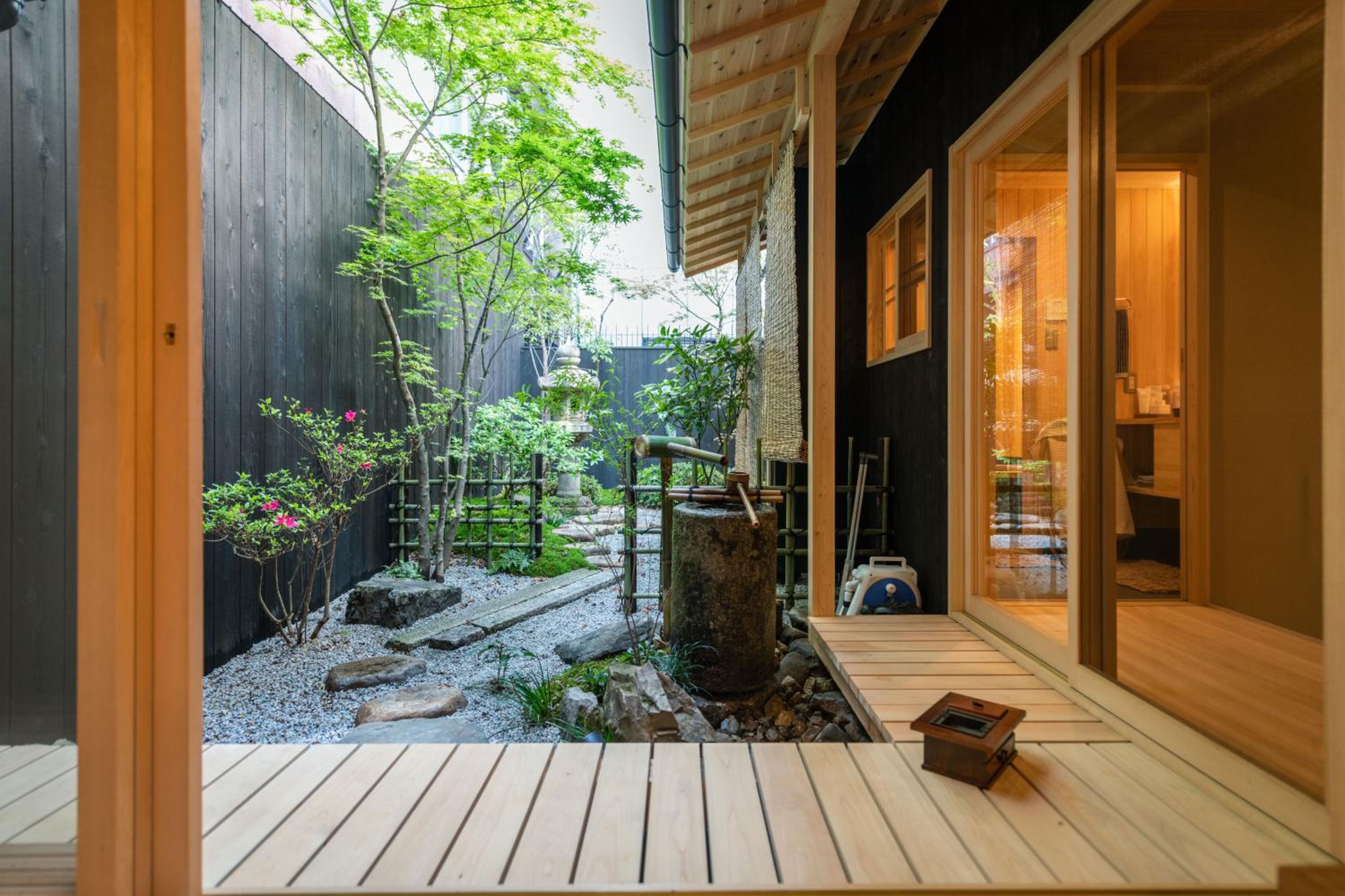 Three-Bedroom House - Photo 25