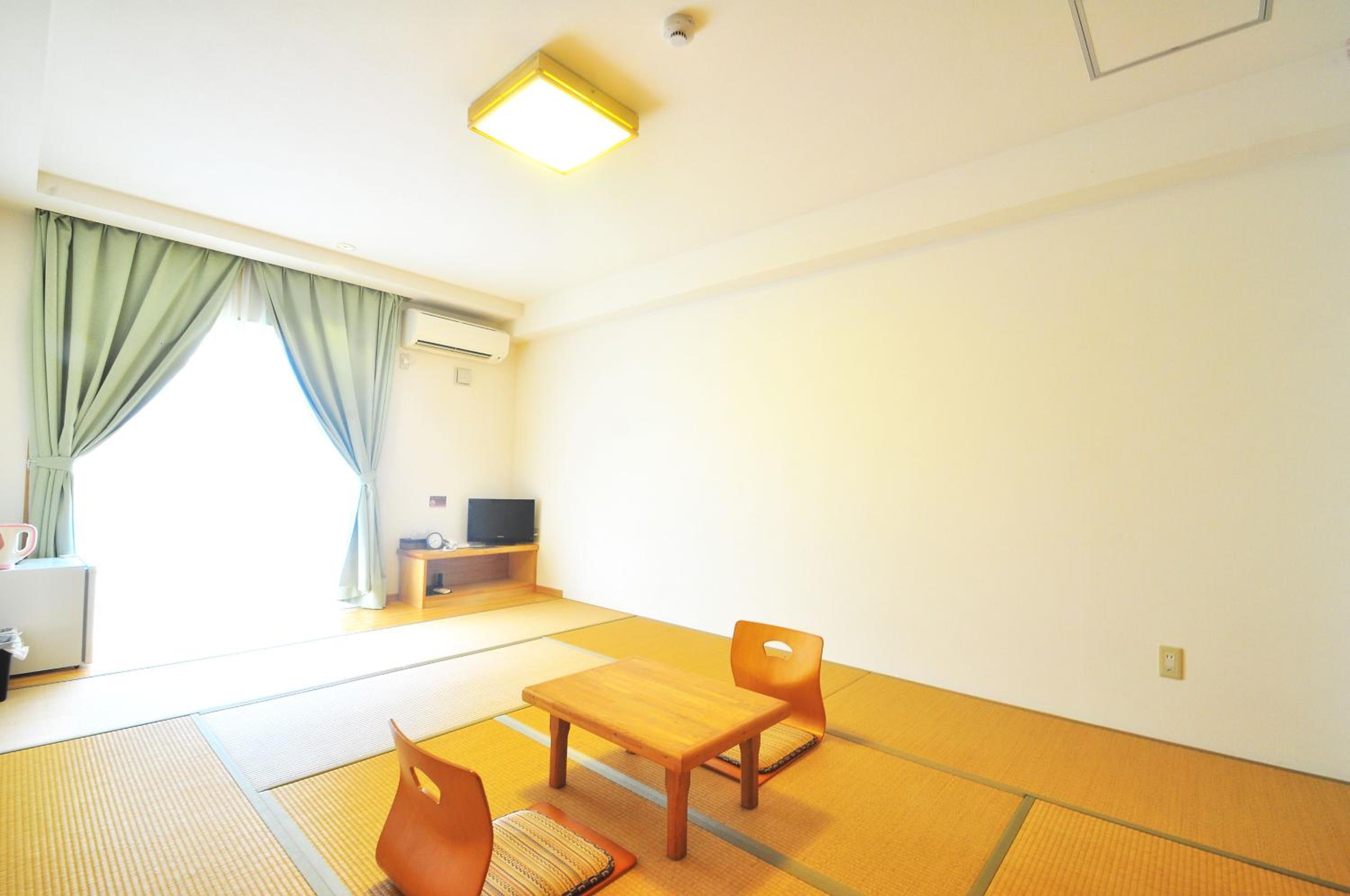 Japanese-Style Quadruple Room photo 3