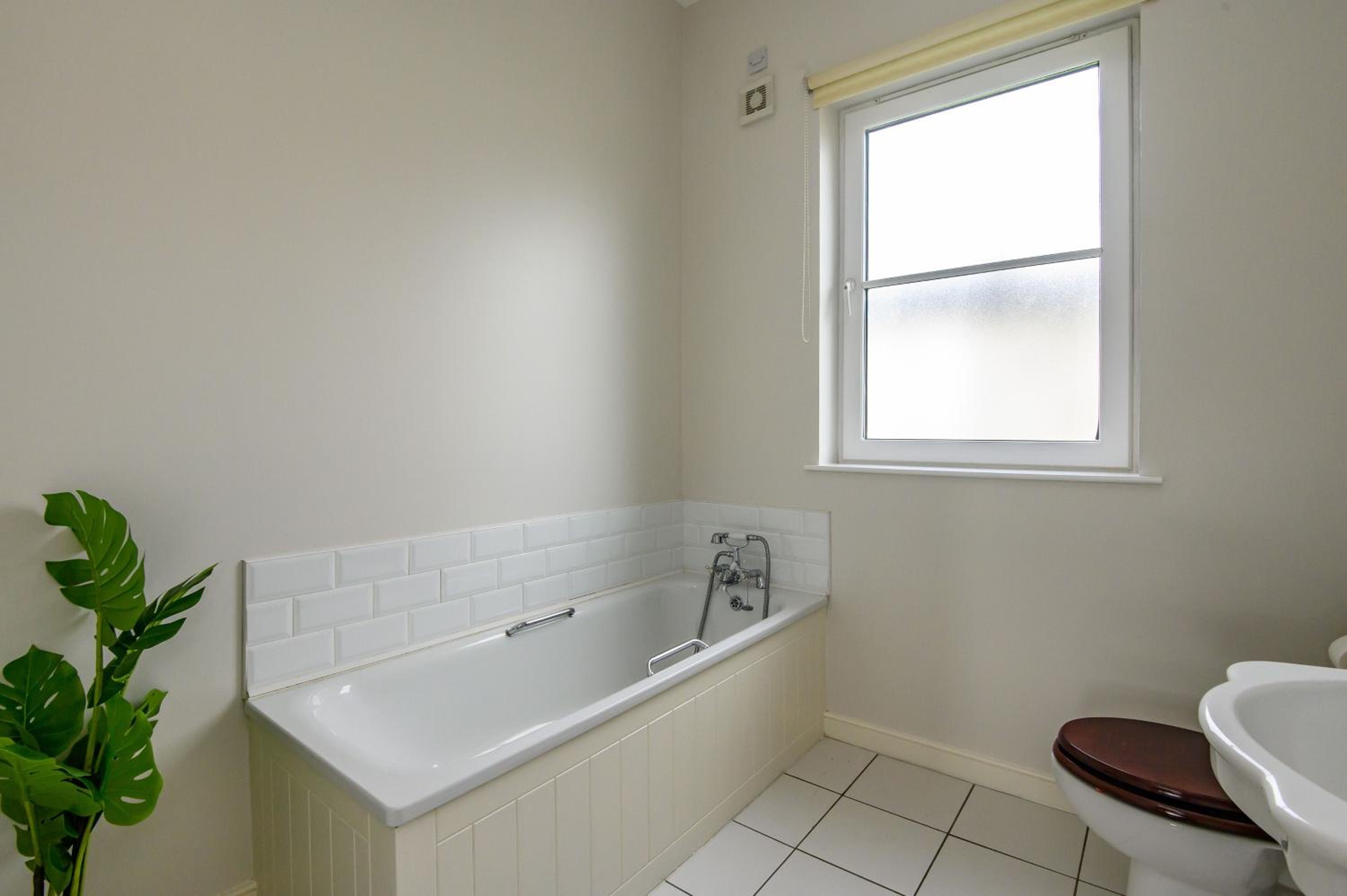 Four-Bedroom House - Photo 10