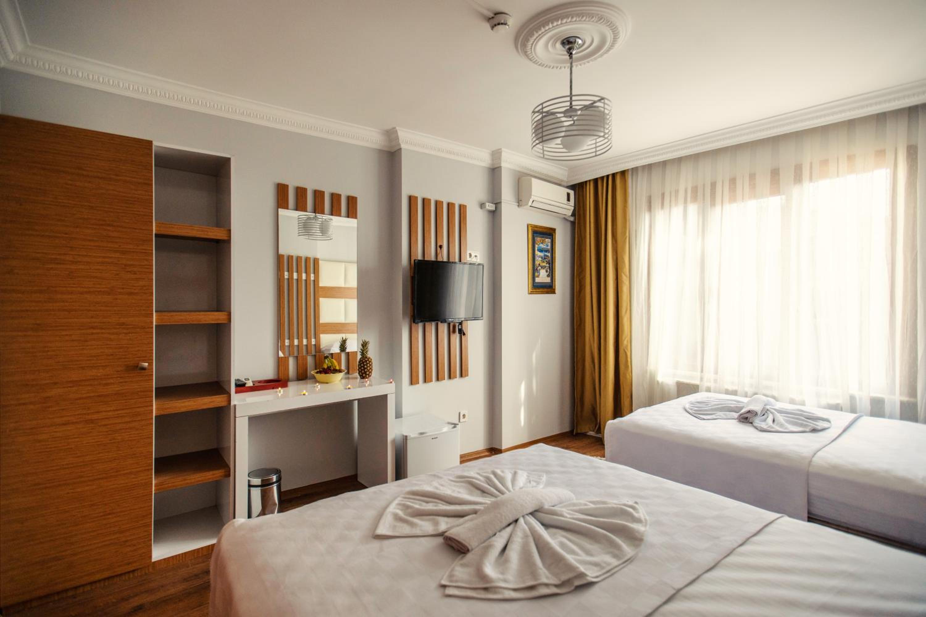 Basic Triple Room photo 2