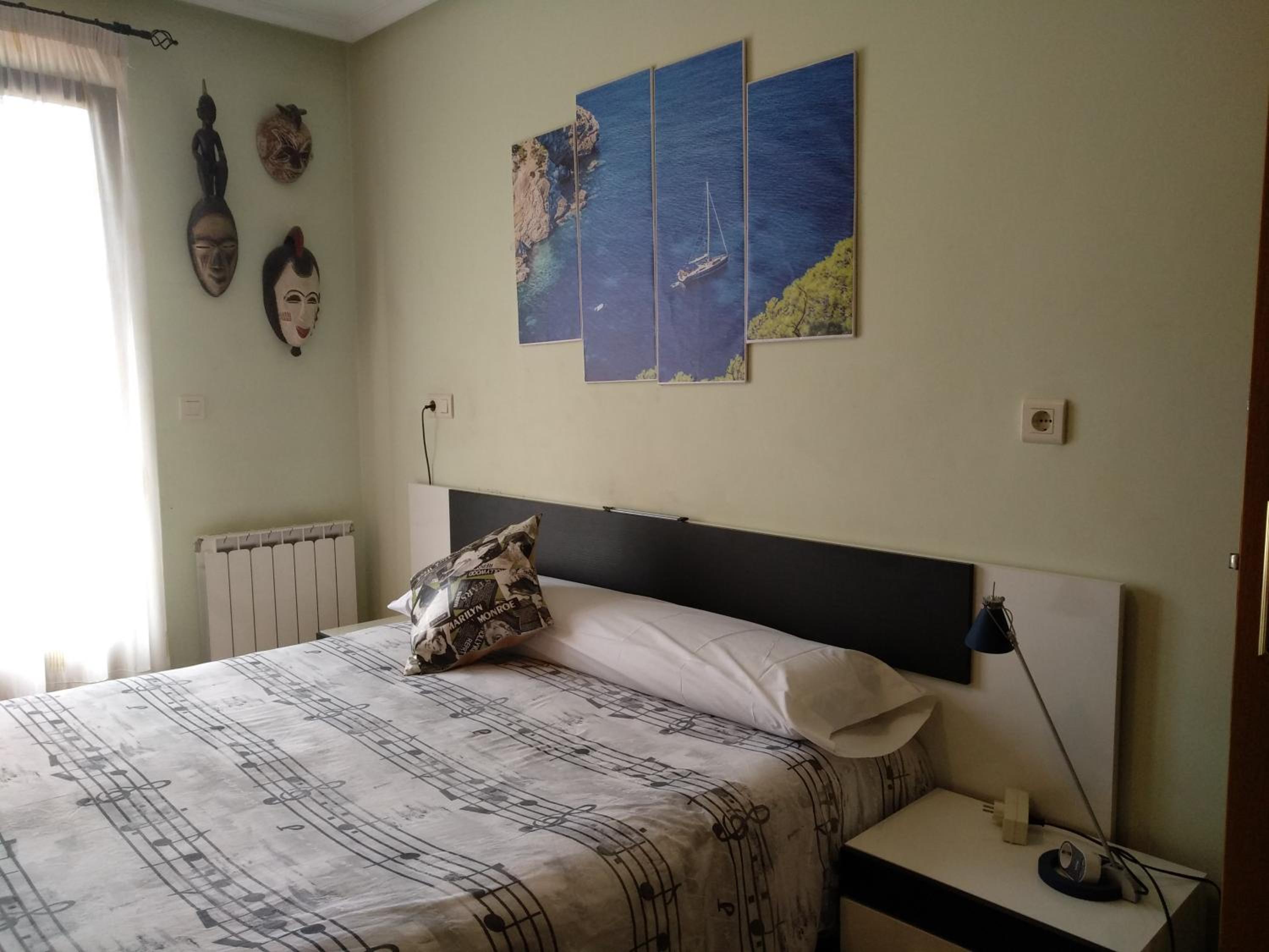 Habitación Queen con Baño Compartido