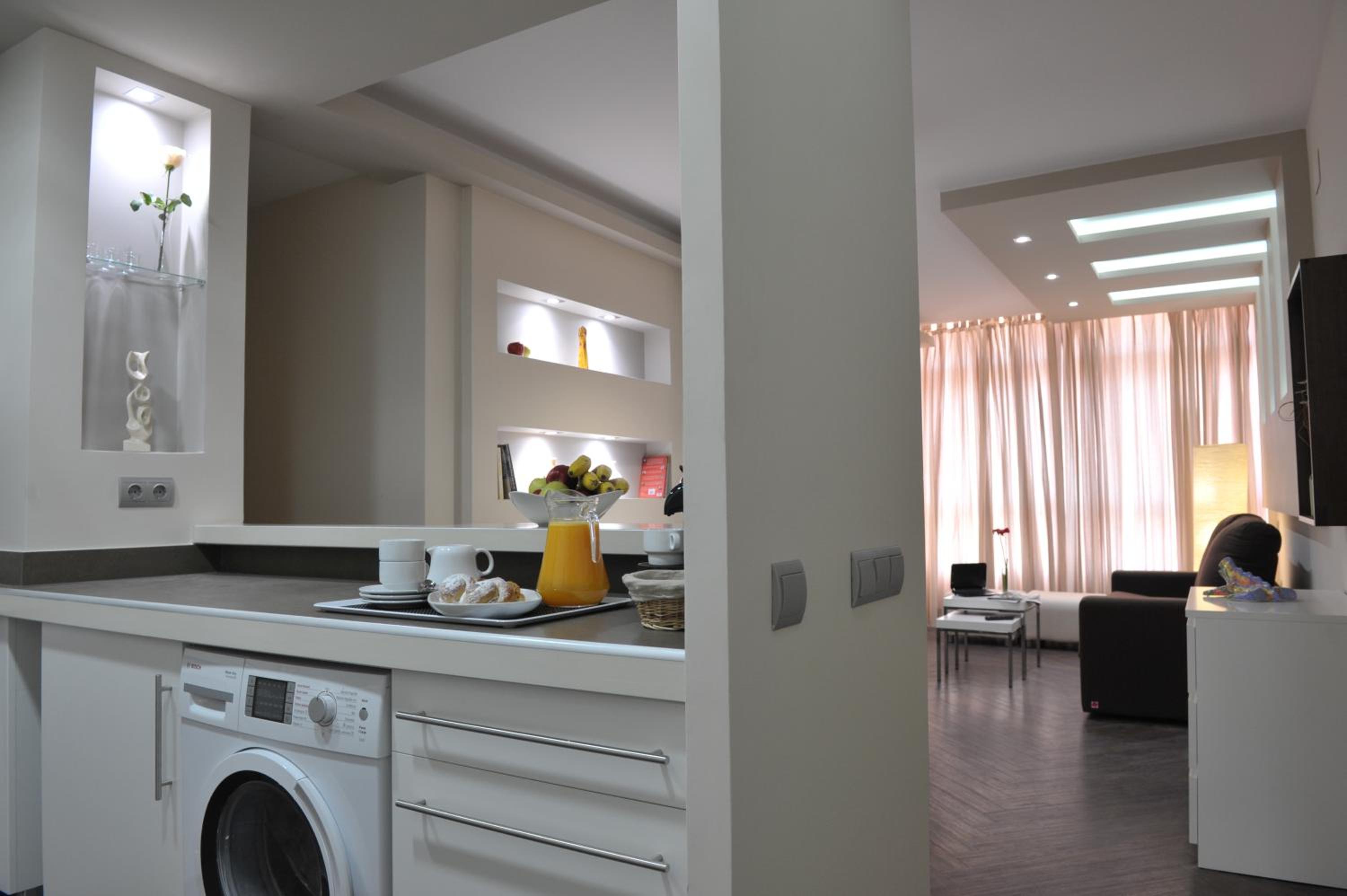 Three-Bedroom Apartment With Spa Bath photo 2