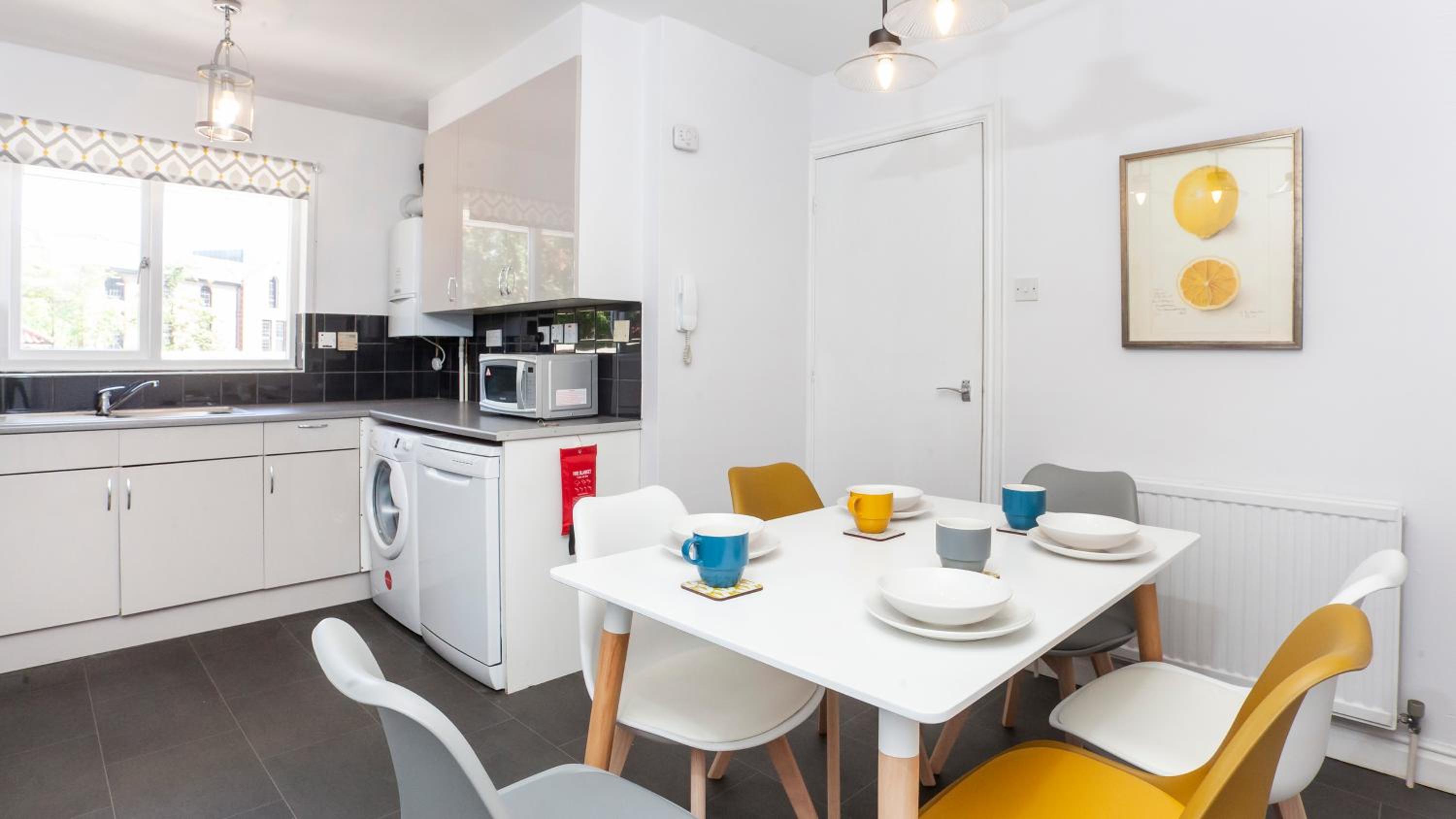 Three-Bedroom Apartment - Photo 2