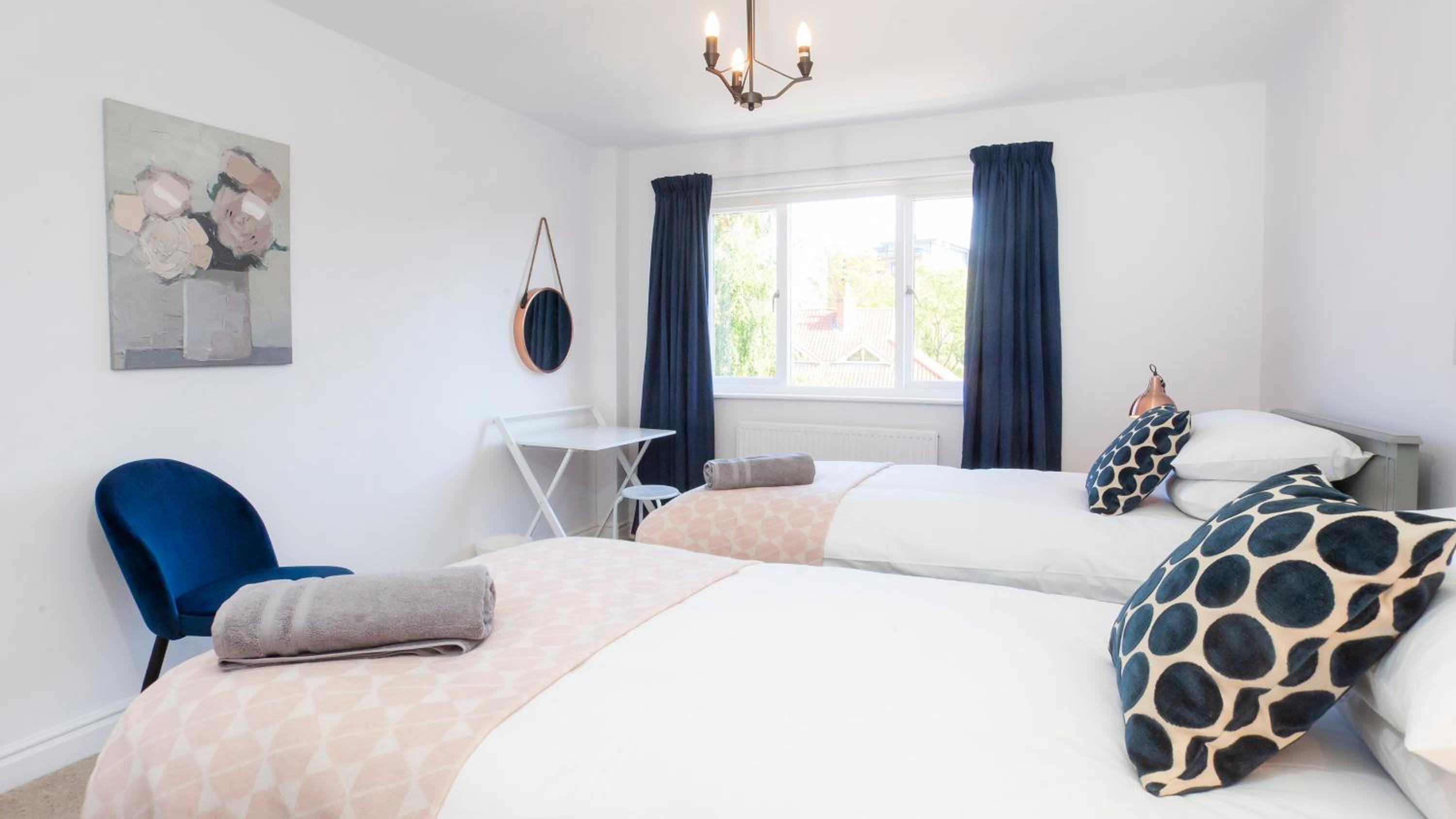 Three-Bedroom Apartment - Photo 12