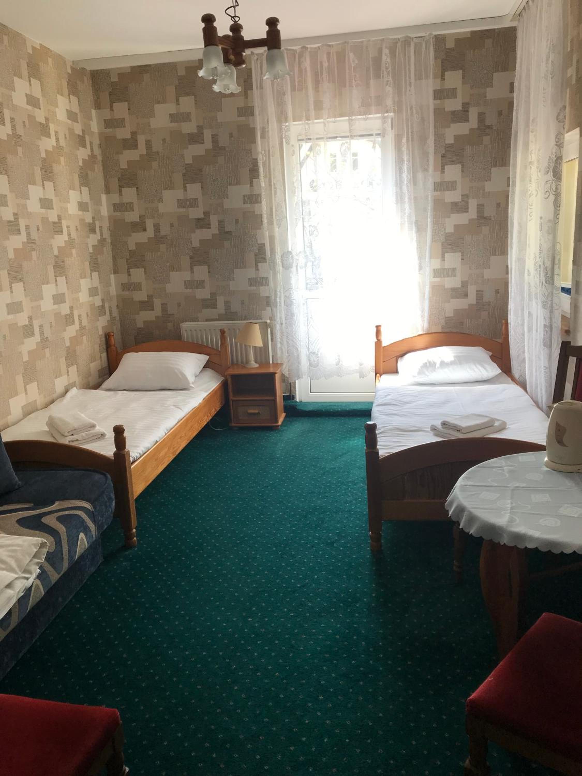 Triple Room with Balcony - Photo 1