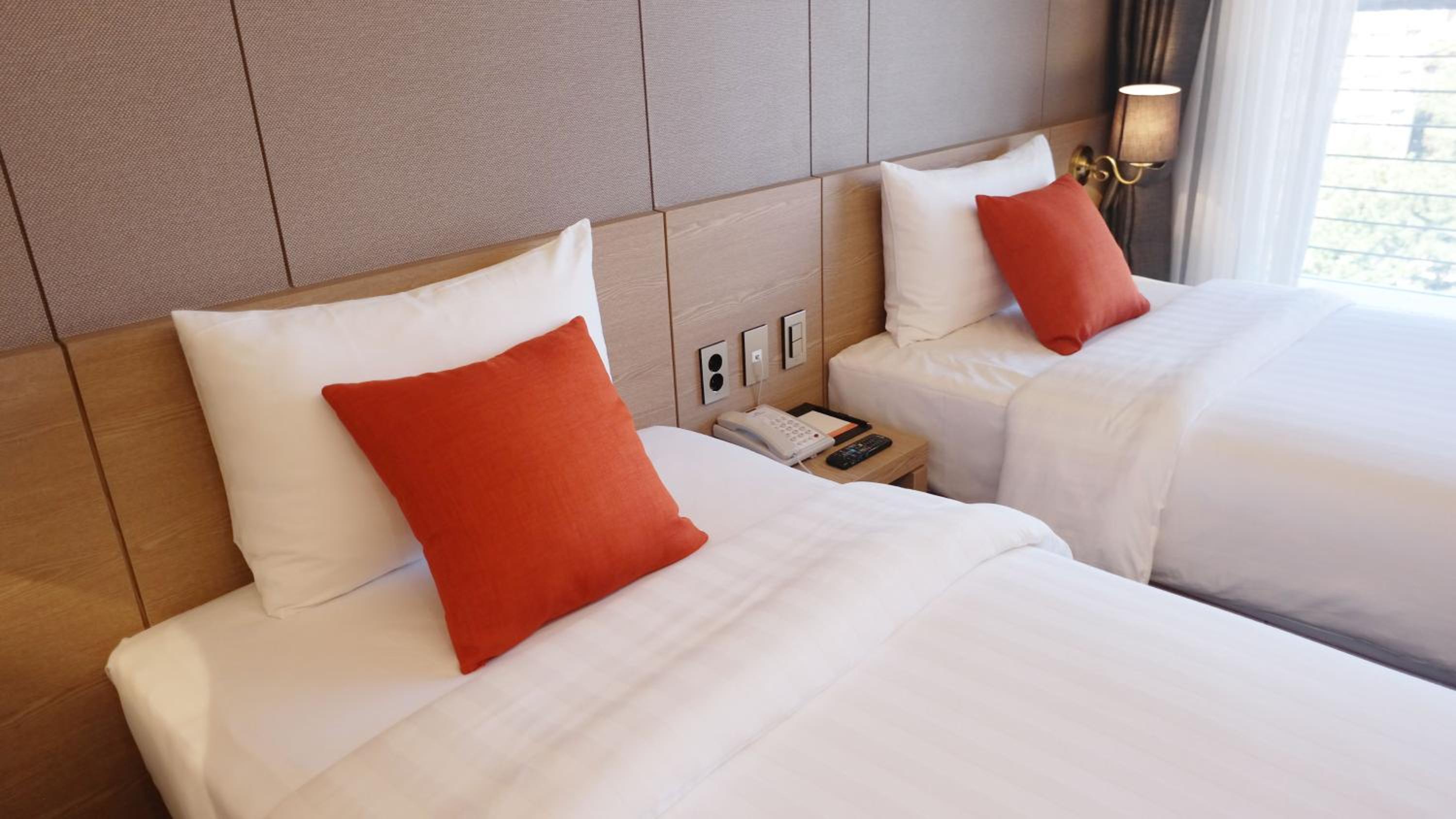 [Special Offer - Jeju Culture PKG] Standard Twin Room + One Jeju Black Pork Set for two nights or longer stays
