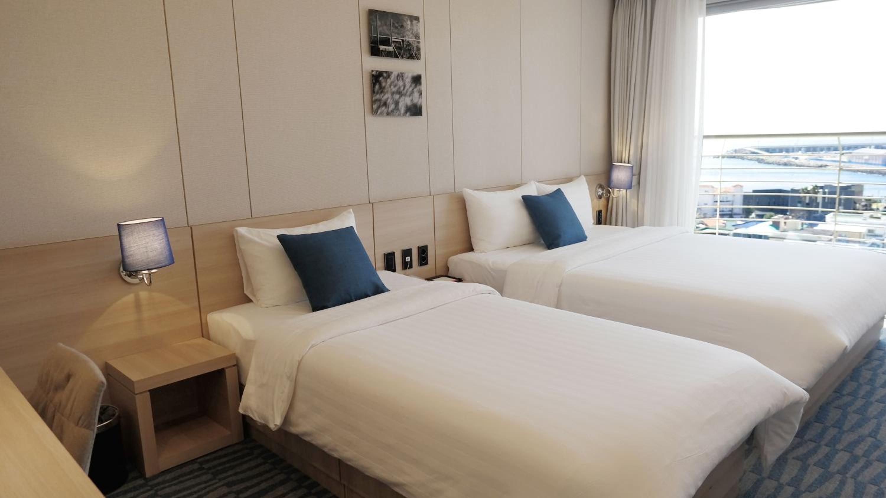 [Special Offer - Jeju Culture PKG] Premier Family Twin Room with Sea View + One Jeju Black Pork Set for two nights or longer stays