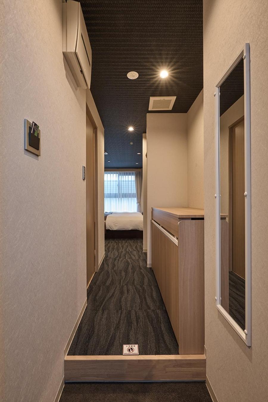 Twin Room with Extra Bed - Photo 10