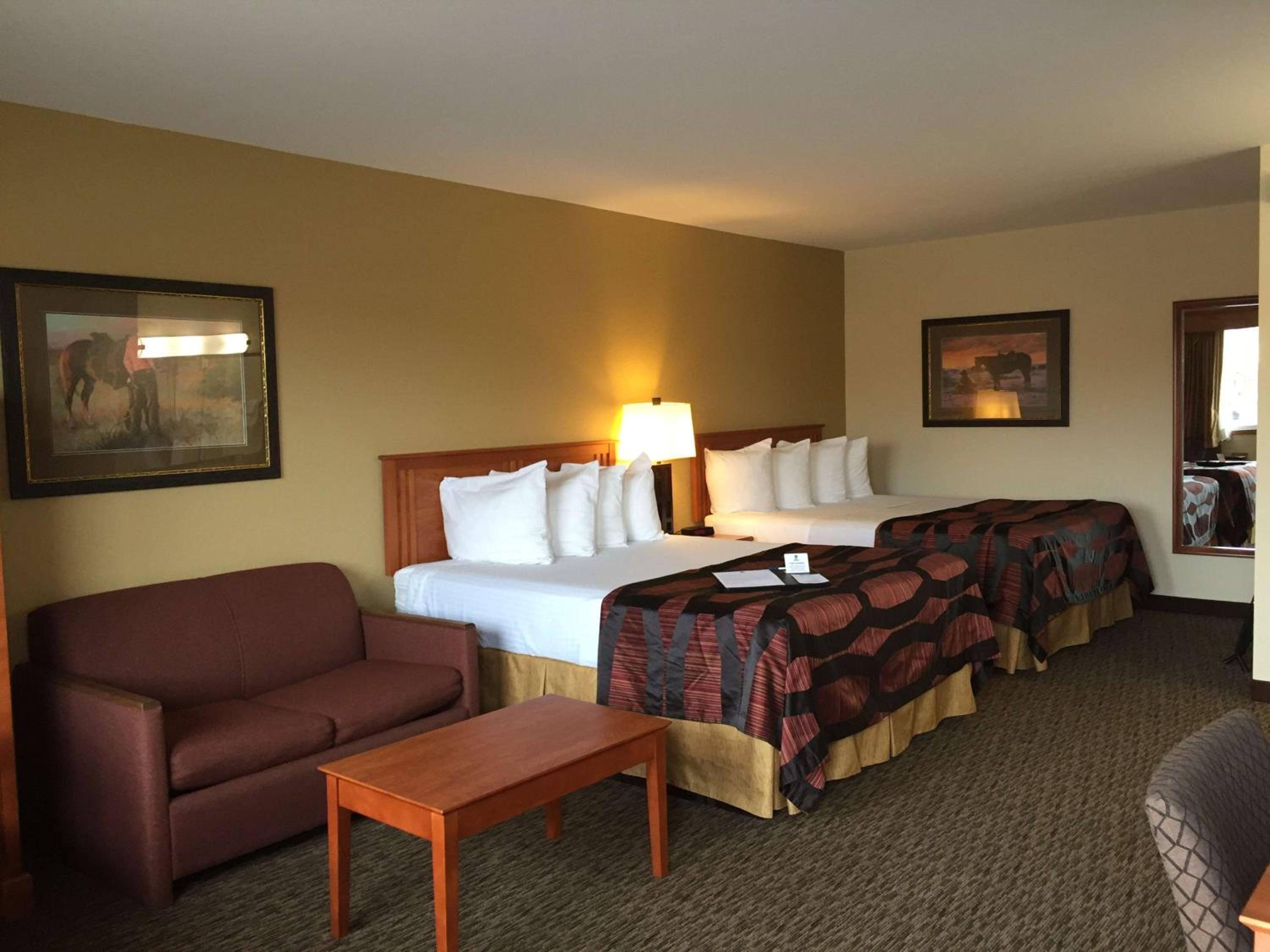 Queen Room with Two Queen Beds and Chair Bed - Non-Smoking photo 1