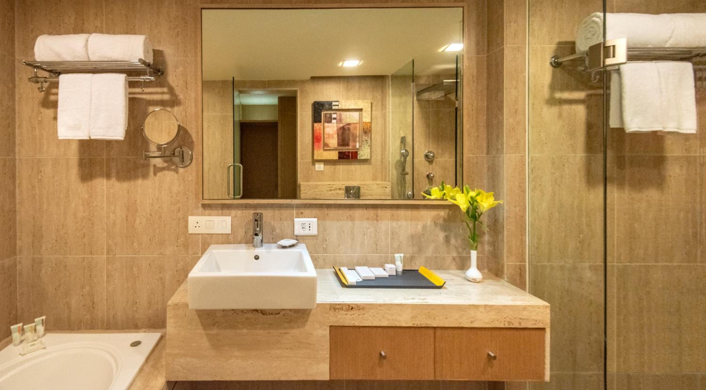 Suite with 20% discount on food and soft beverages, Laundry and liquor and spa, late check out until 3 hrs (subject to availability), INR 500 credit, Complimentary Access to Club Lounge (5 PM - 7 PM) one mug of freshly brewed beer during the stay (330 ml)