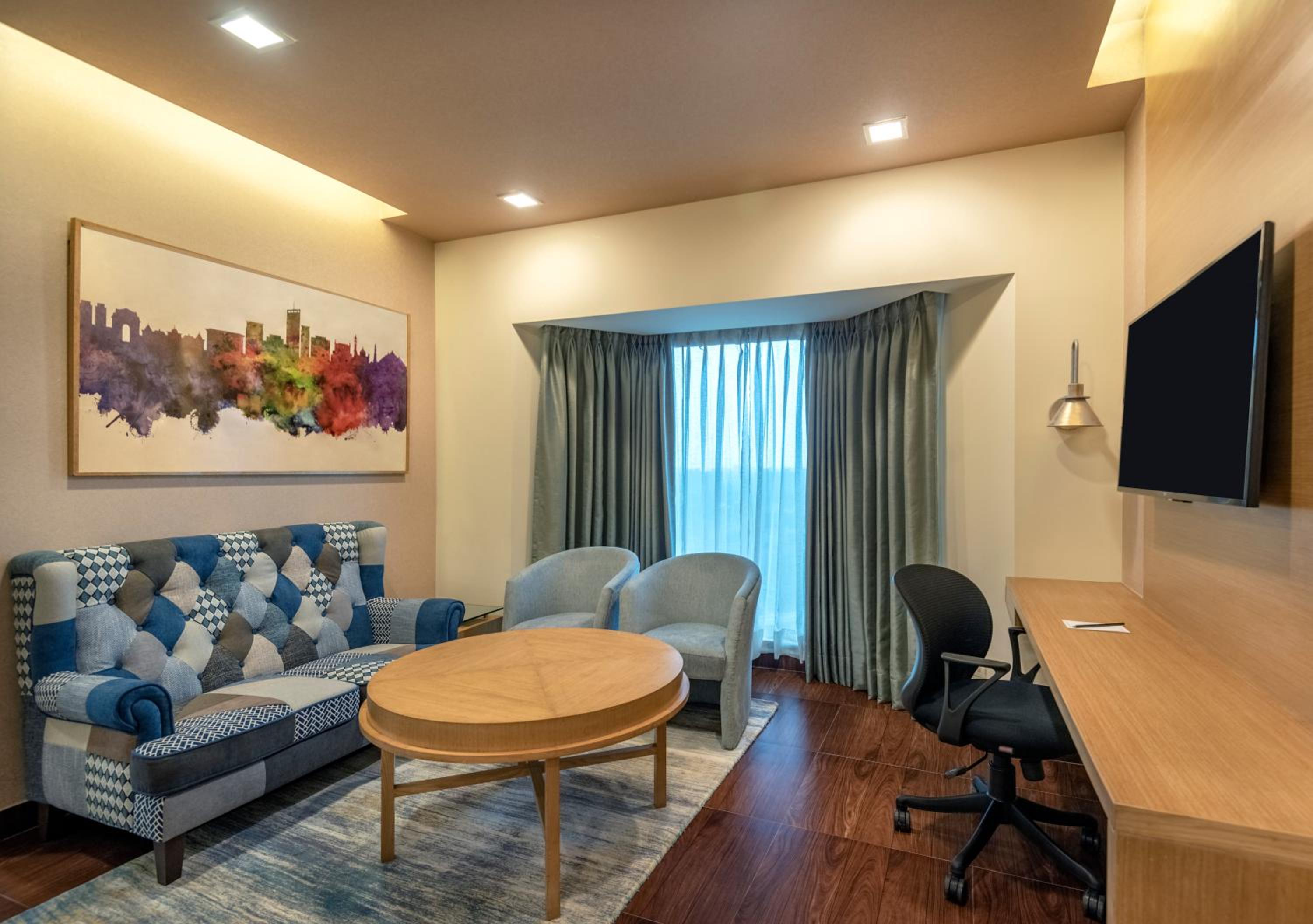 Suite with 20% discount on food and soft beverages, Laundry and liquor and spa, late check out until 3 hrs (subject to availability), INR 500 credit, Complimentary Access to Club Lounge (5 PM - 7 PM) one mug of freshly brewed beer during the stay (330 ml)