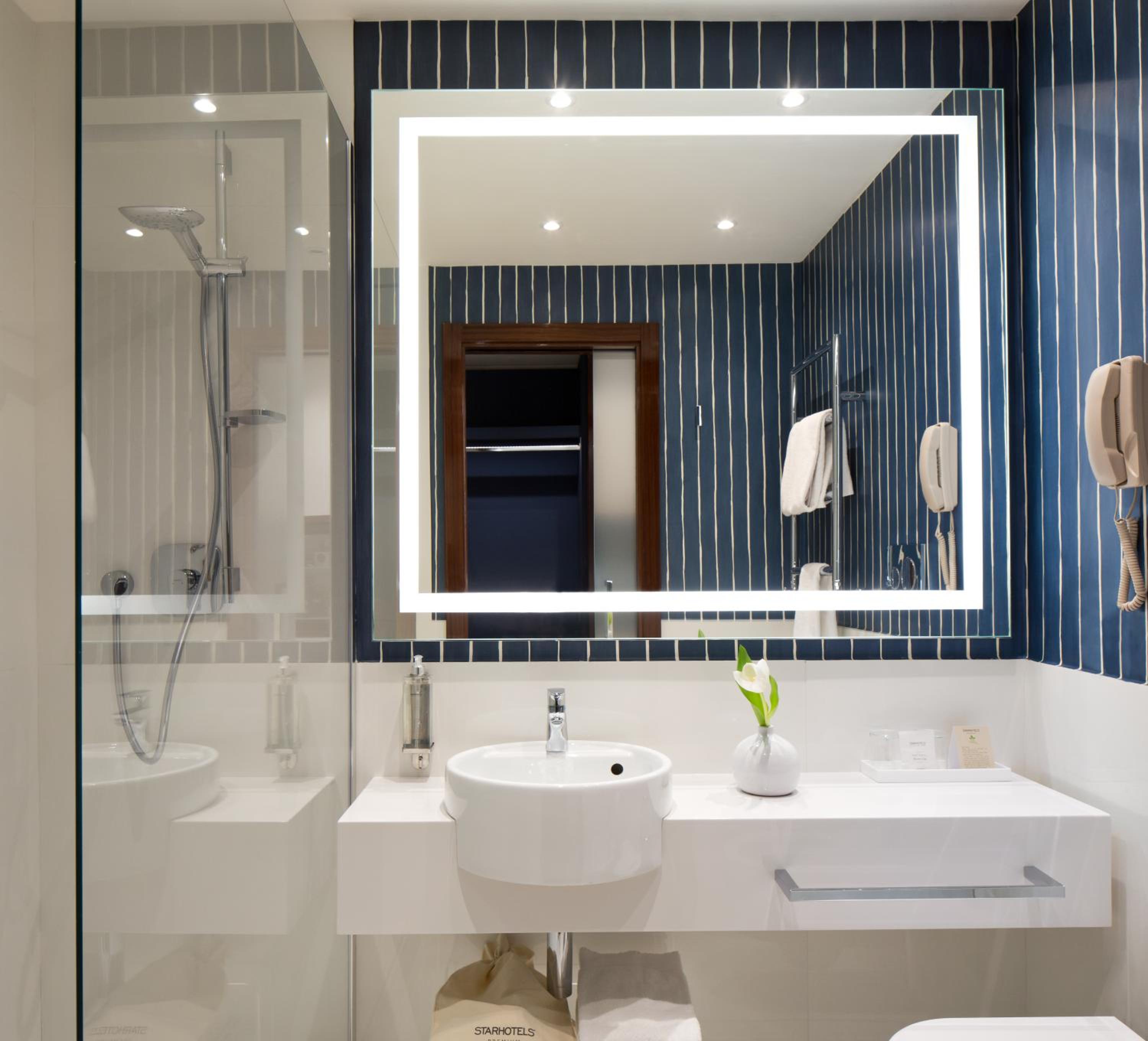 Relax in this chic, modern bathroom oasis.