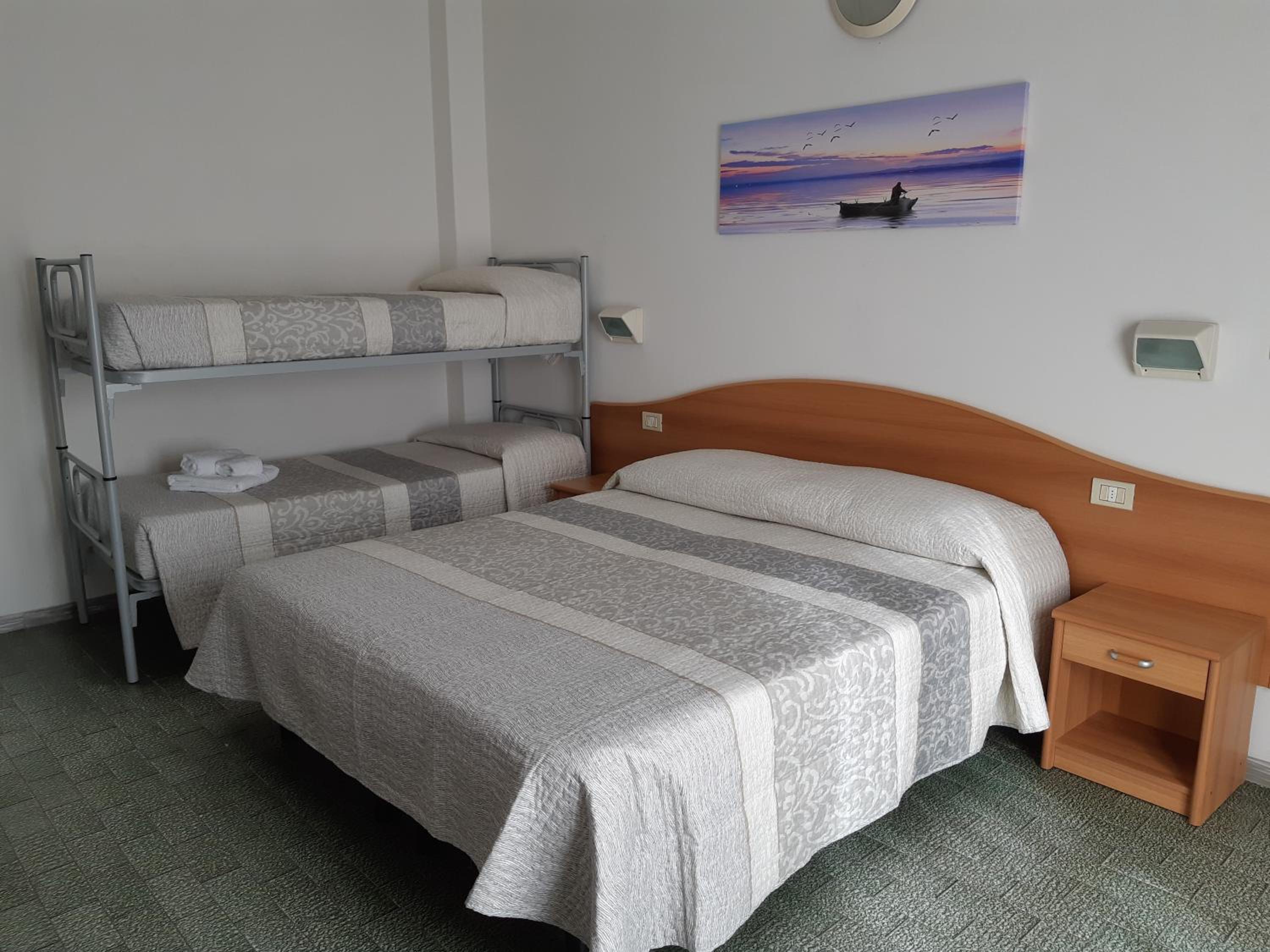 Quadruple Room with Balcony - Photo 3