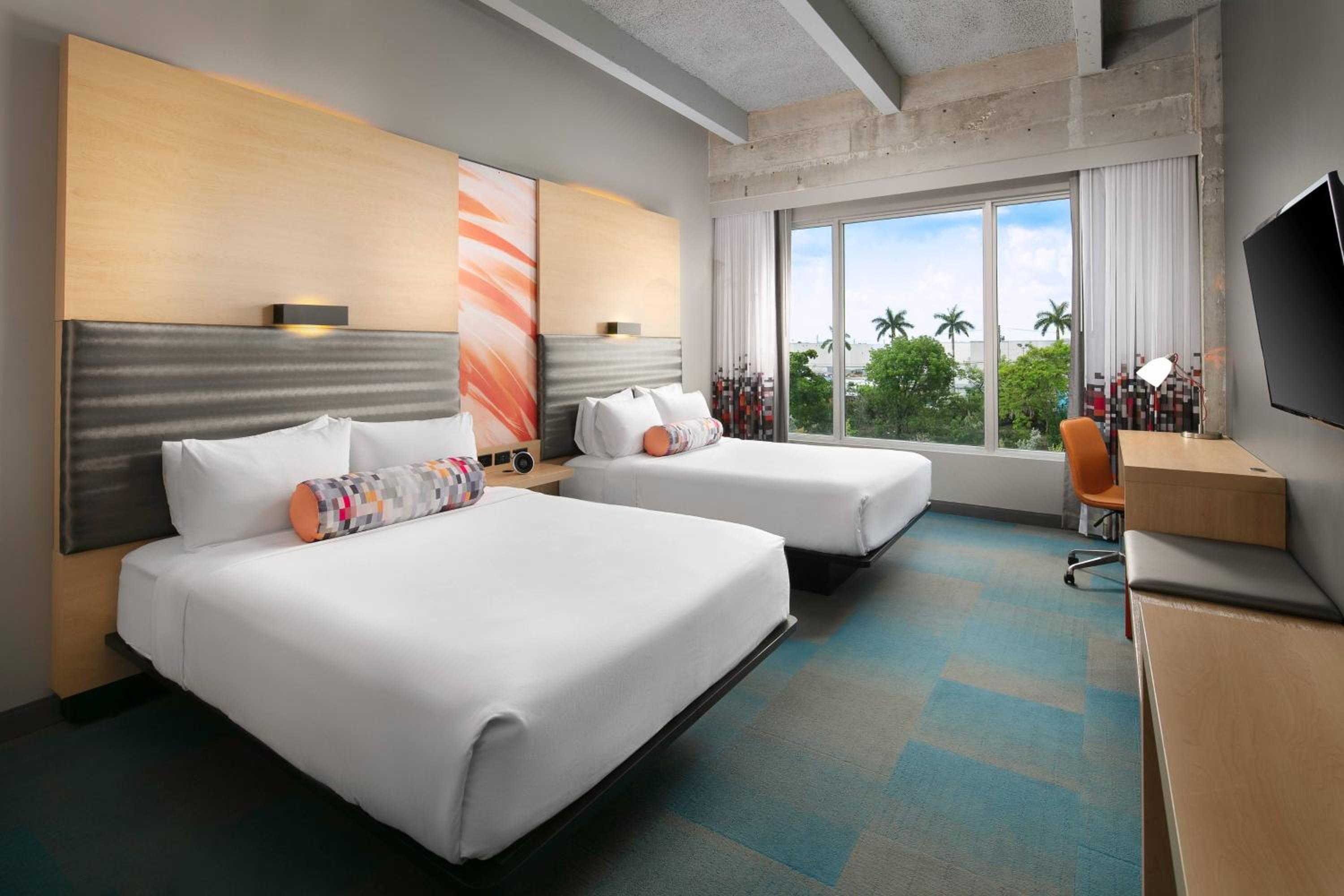 Queen Room with Two Queen Beds and Pool View - Hearing Accessible