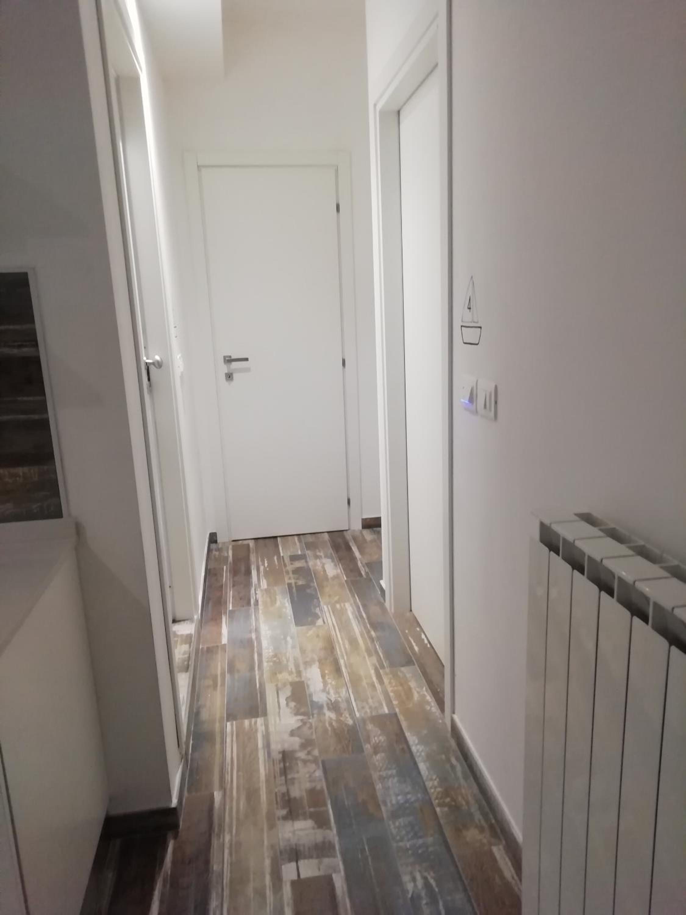Deluxe Quadruple Room - Photo 12