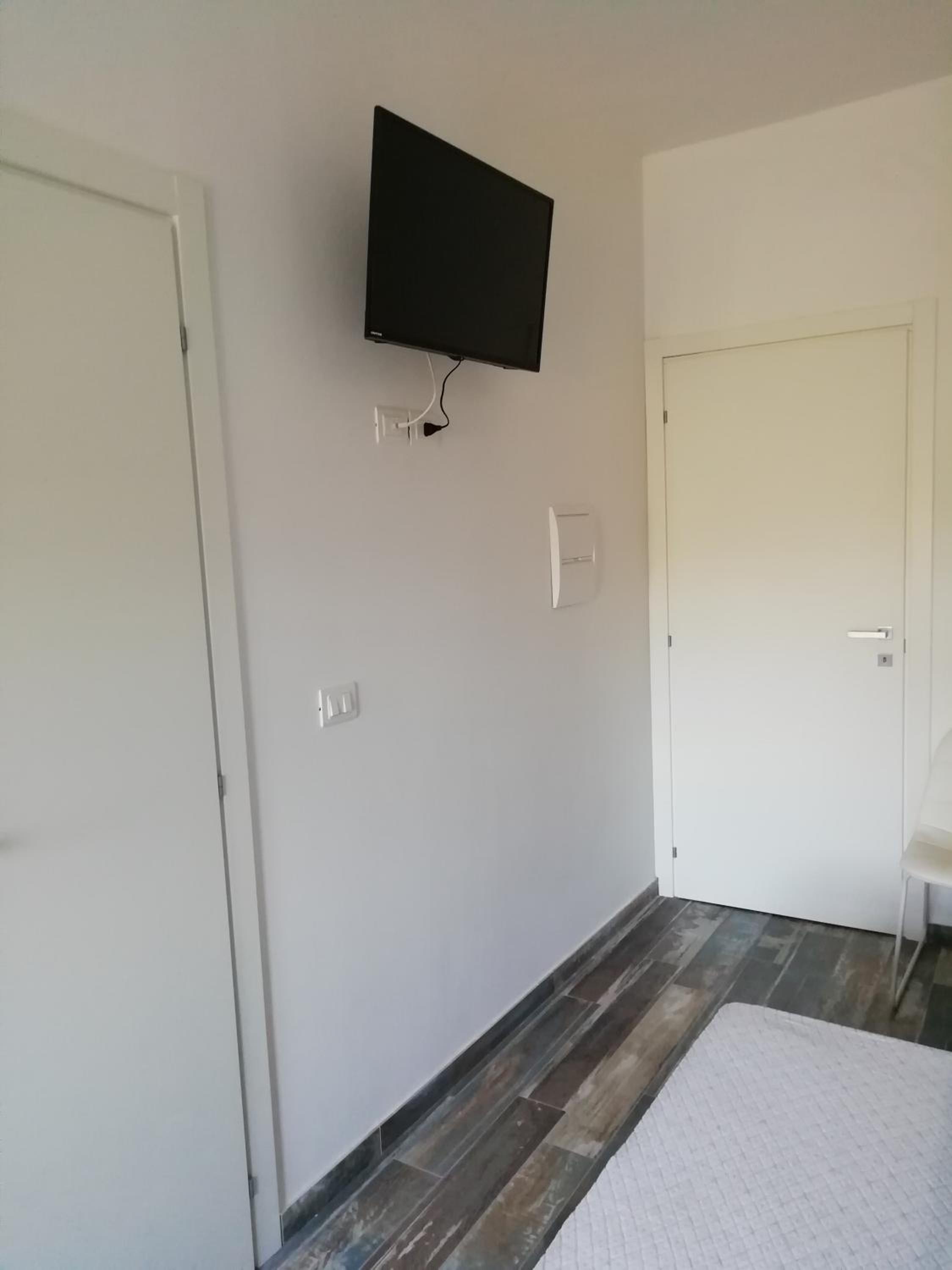 Deluxe Quadruple Room - Photo 11