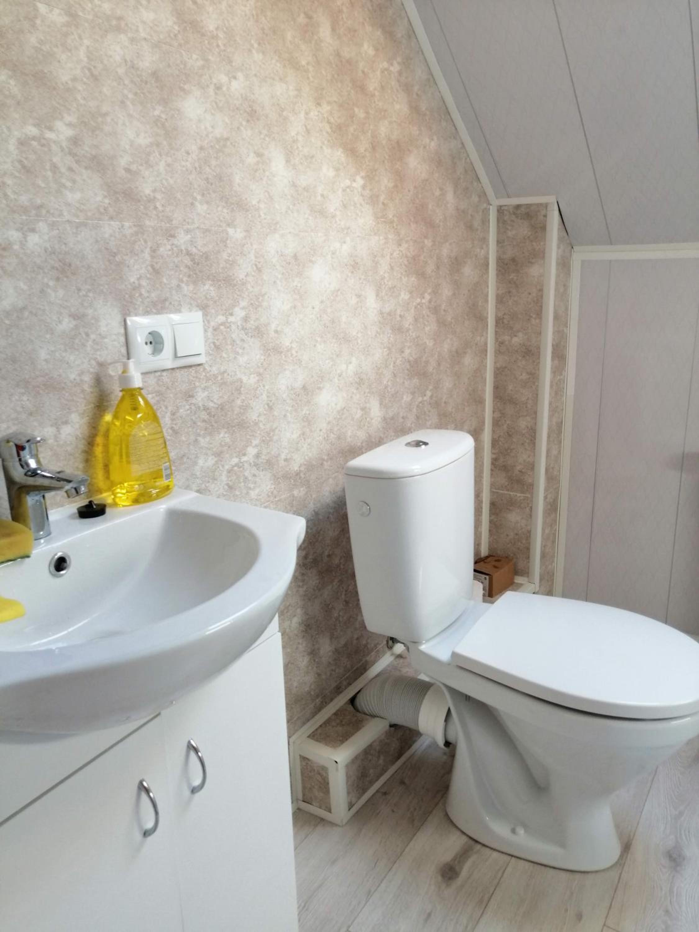 Three-Bedroom House - Photo 18