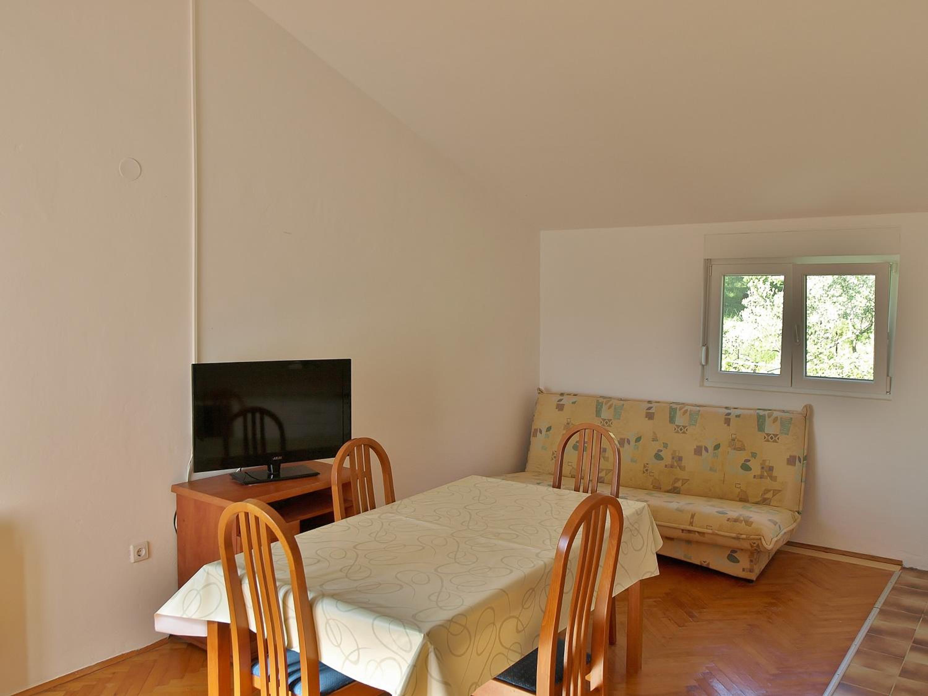 Three-Bedroom Apartment photo 1