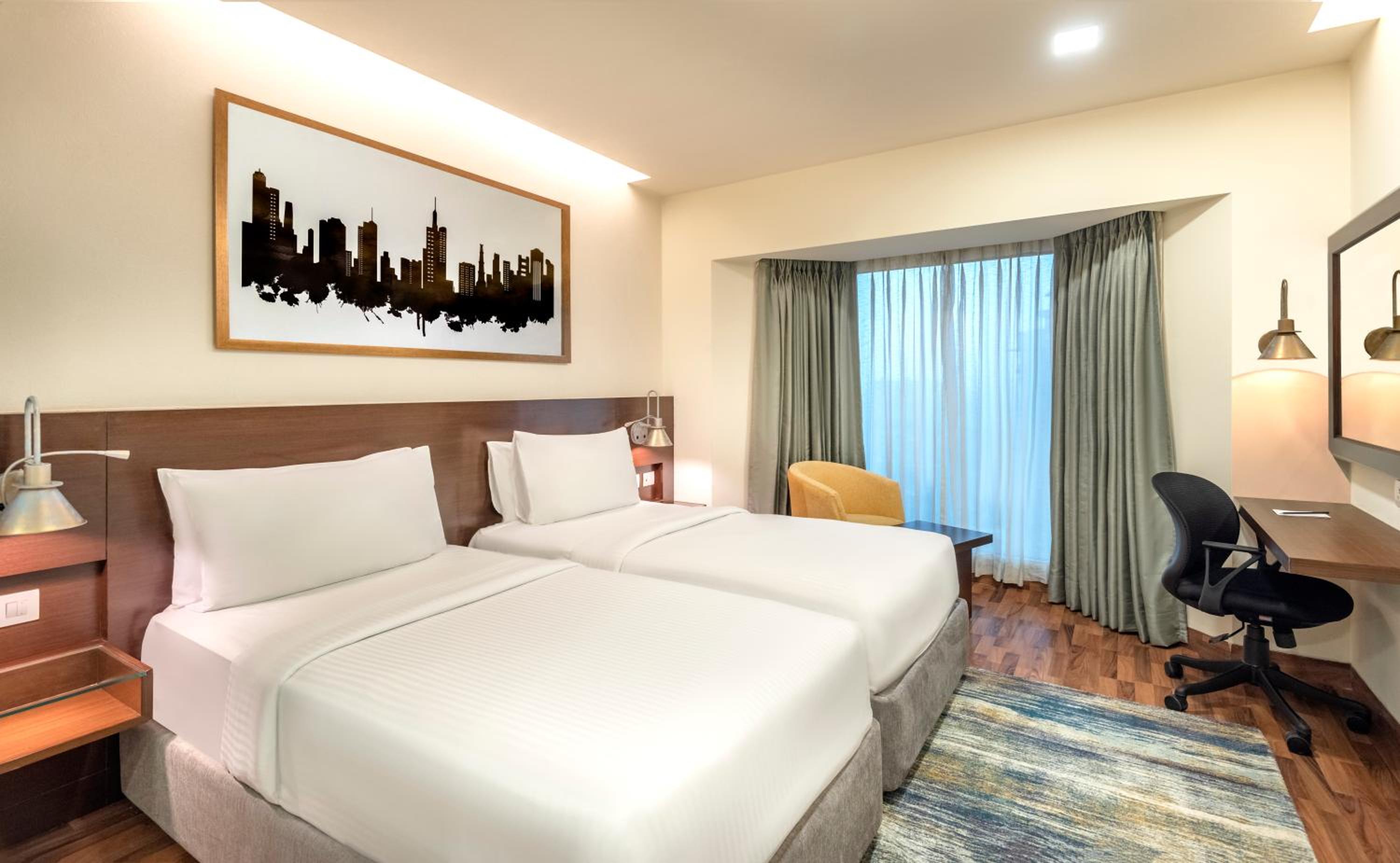Superior Double or Twin Room with 20% Discount on food and soft beverages, Laundry and liquor and spa, INR 500 credit,one mug of freshly brewed beer during the stay ((330 ml)