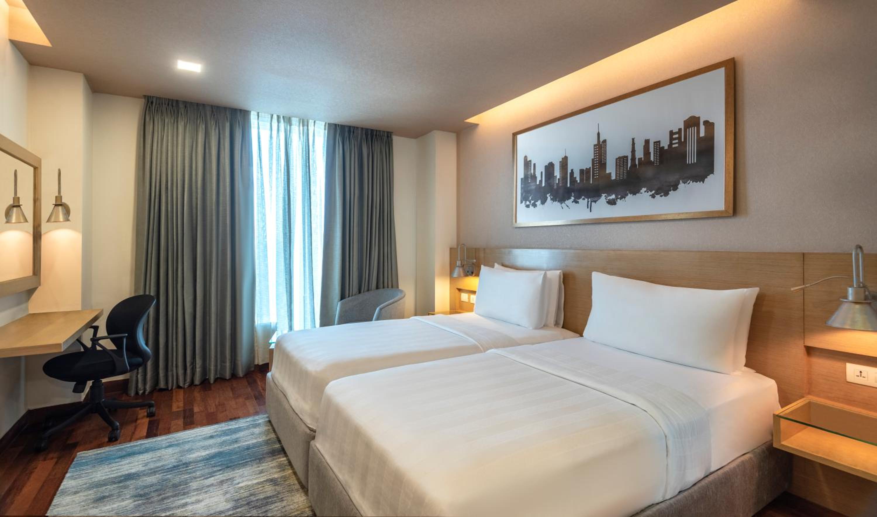 Deluxe Double or Twin Room with 20% Discount on food and soft beverages, Laundry and liquor and spa, INR 500 credit, one mug of freshly brewed beer during the stay ((330 ml)