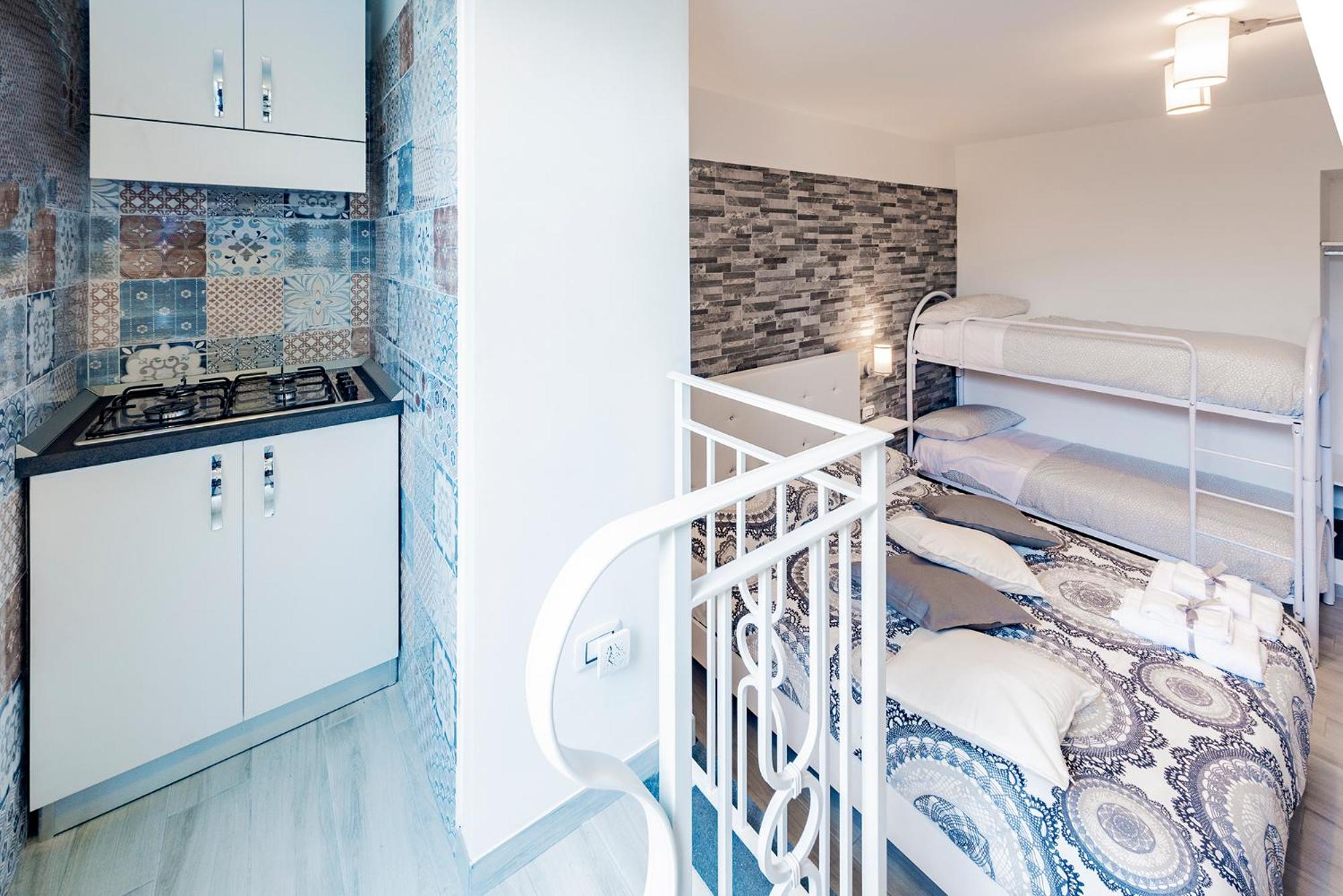 Luxury Quadruple Room - Photo 6