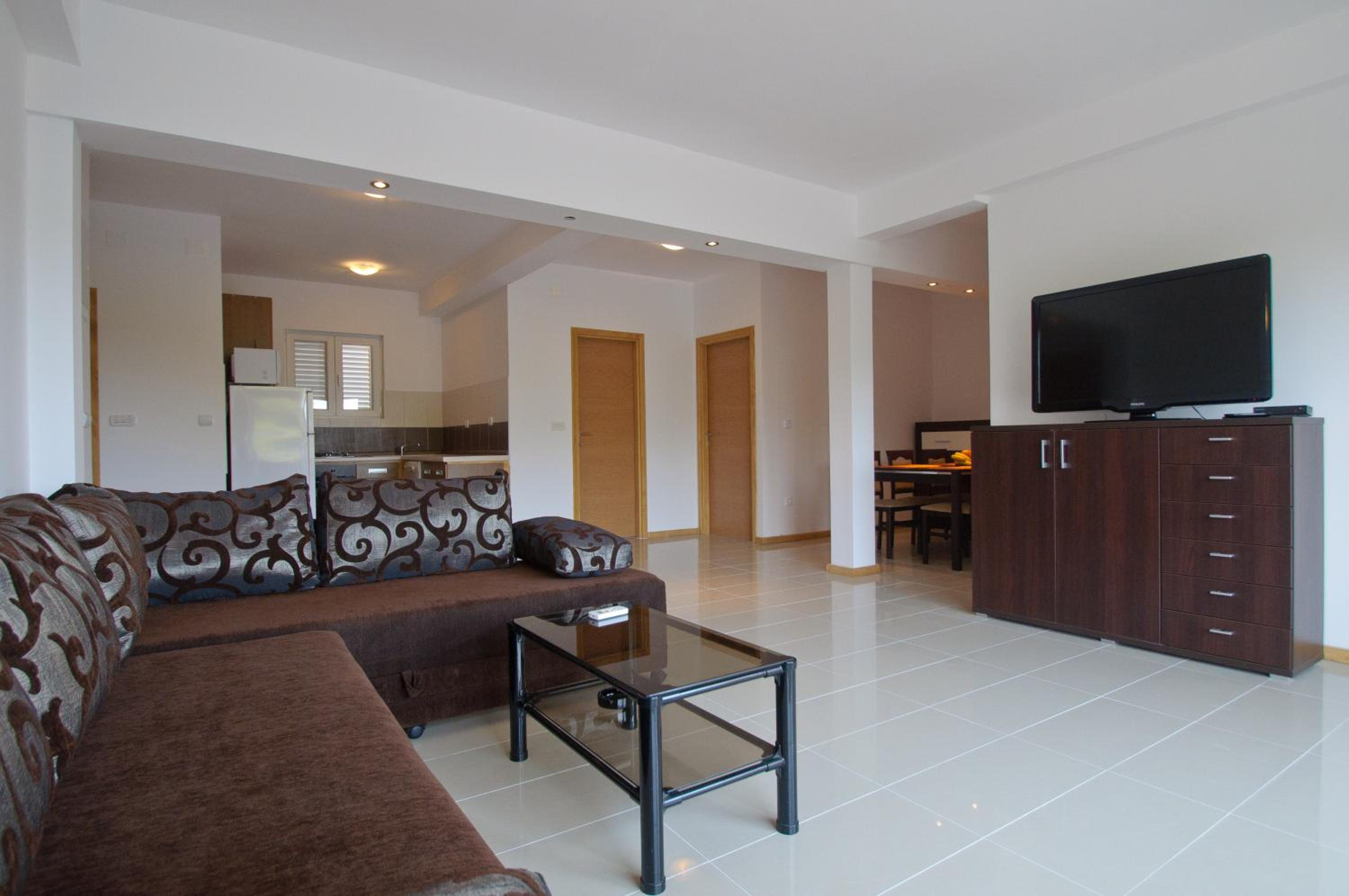 Four-Bedroom Apartment With Balcony 