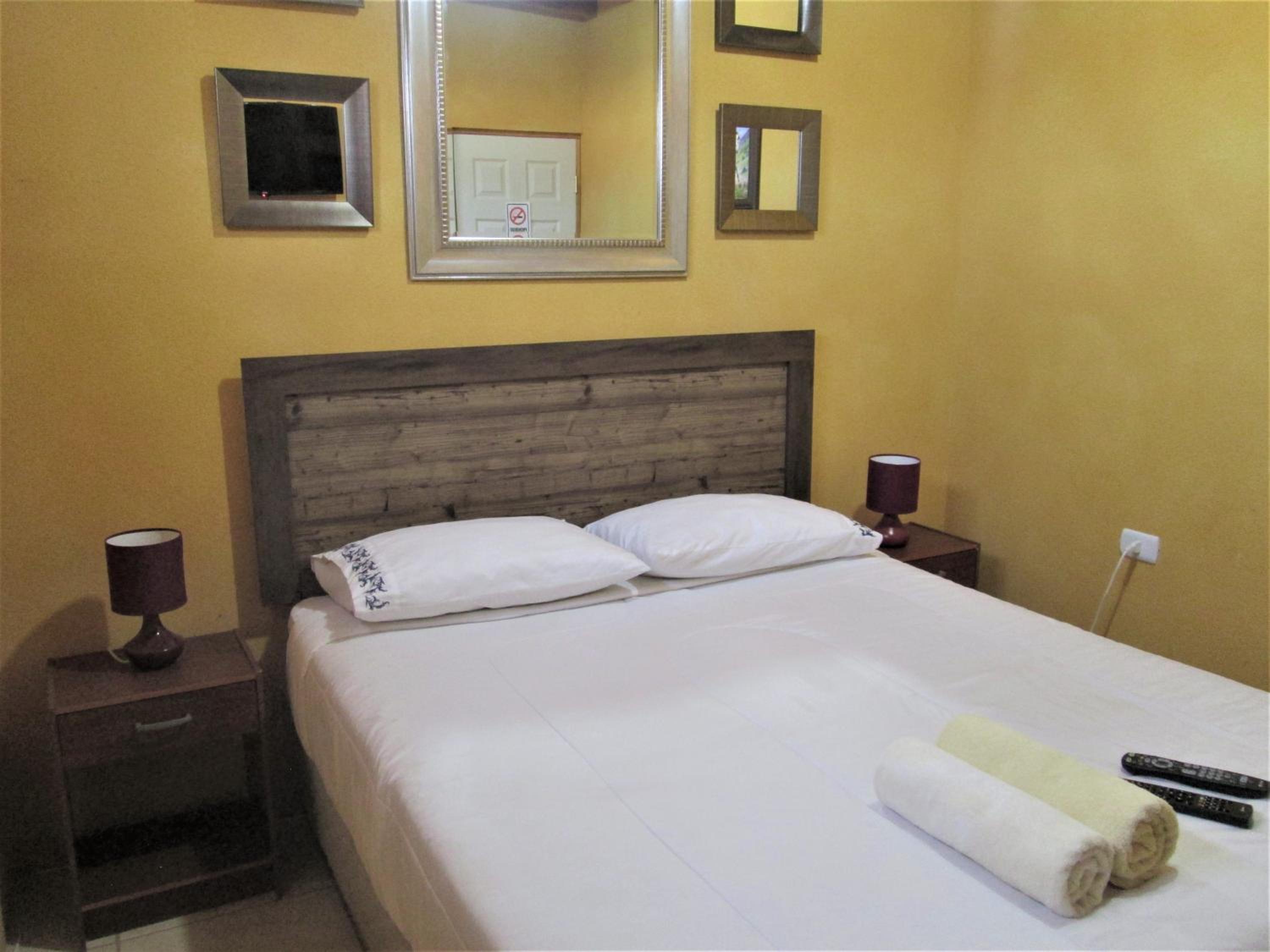 Queen Room with Shared Bathroom