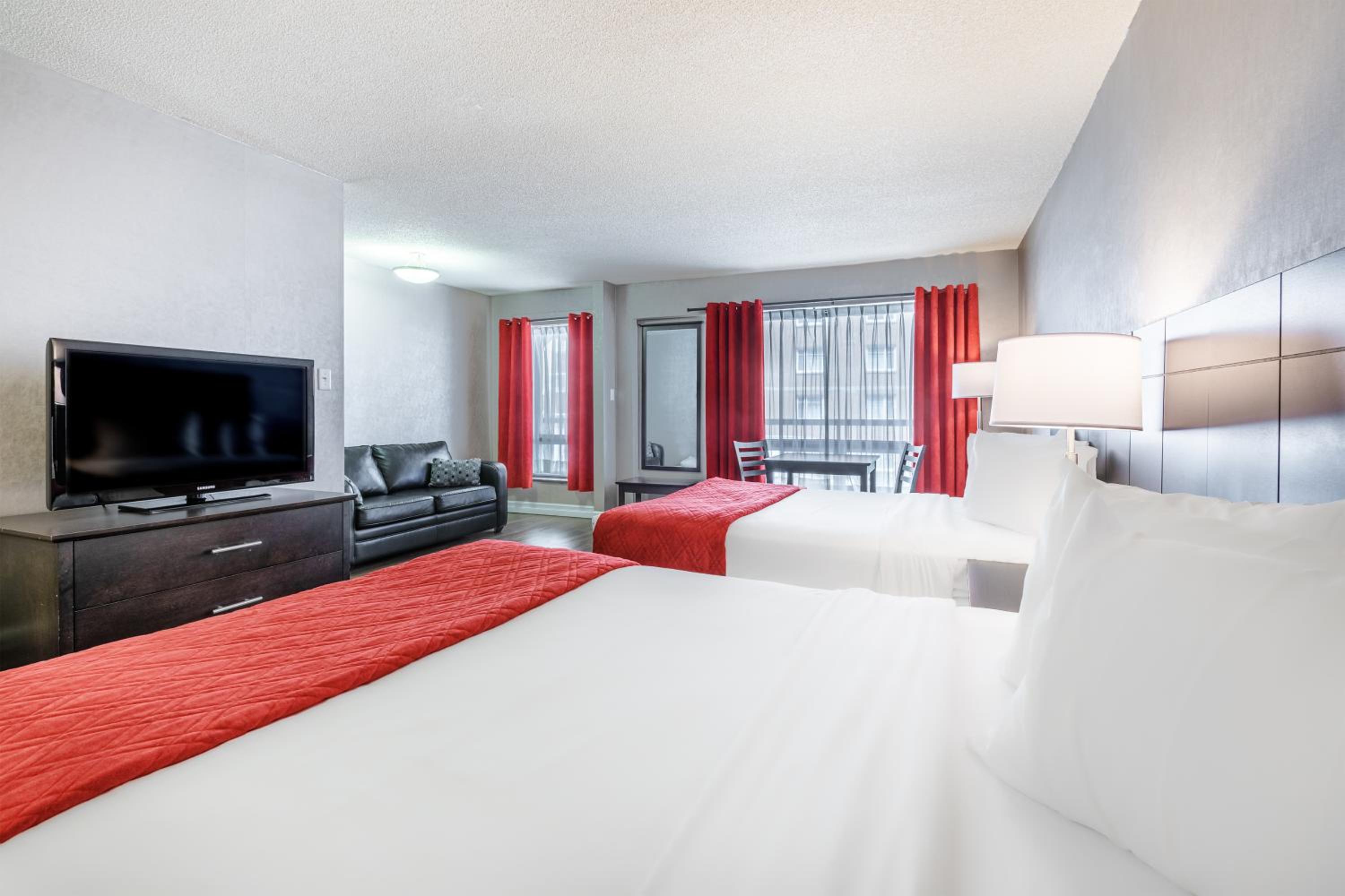 Deluxe Room with Two Queen Beds - Photo 1