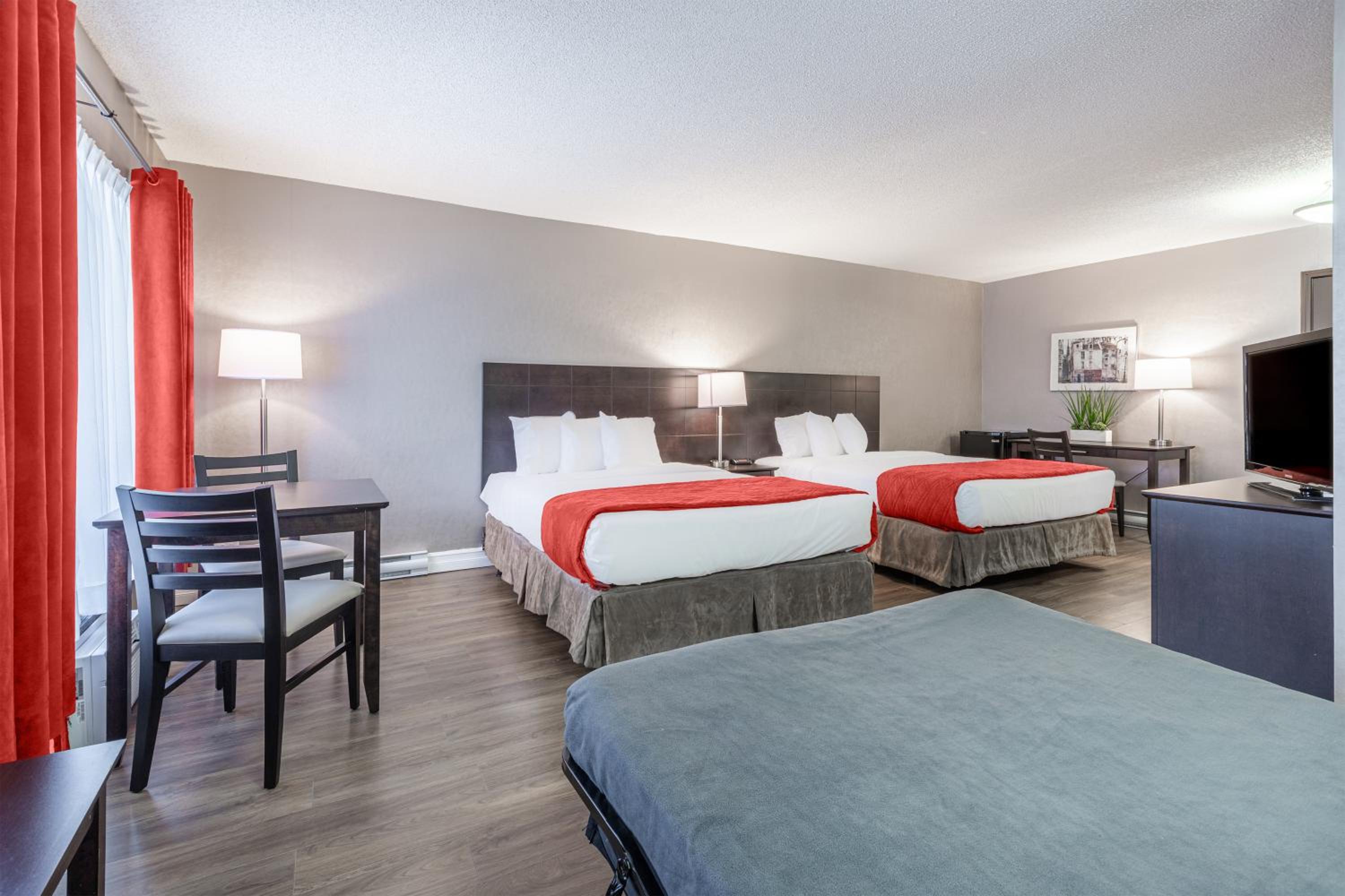 Deluxe Room with Two Queen Beds - Photo 2