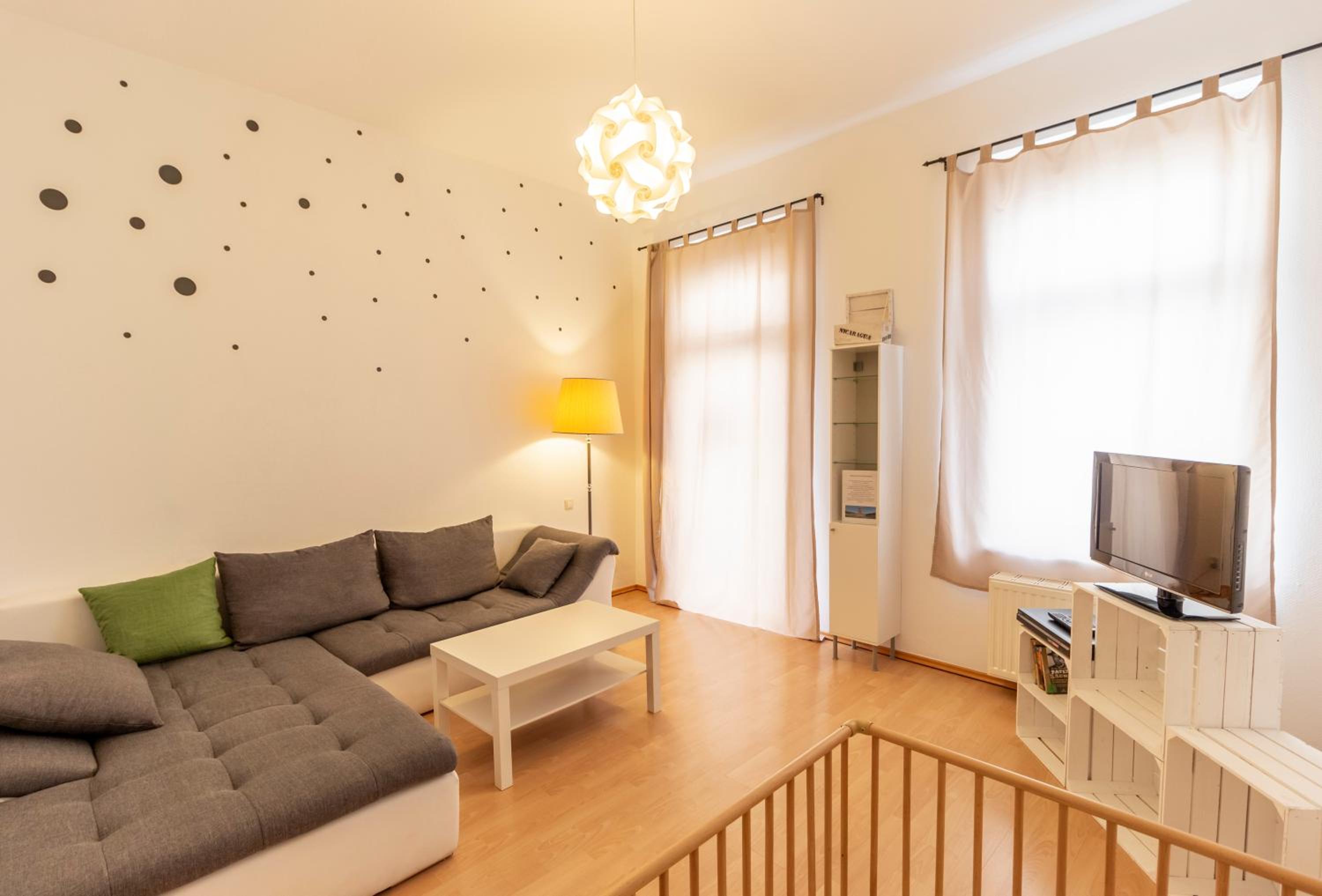 Three-Bedroom Apartment - Photo 2