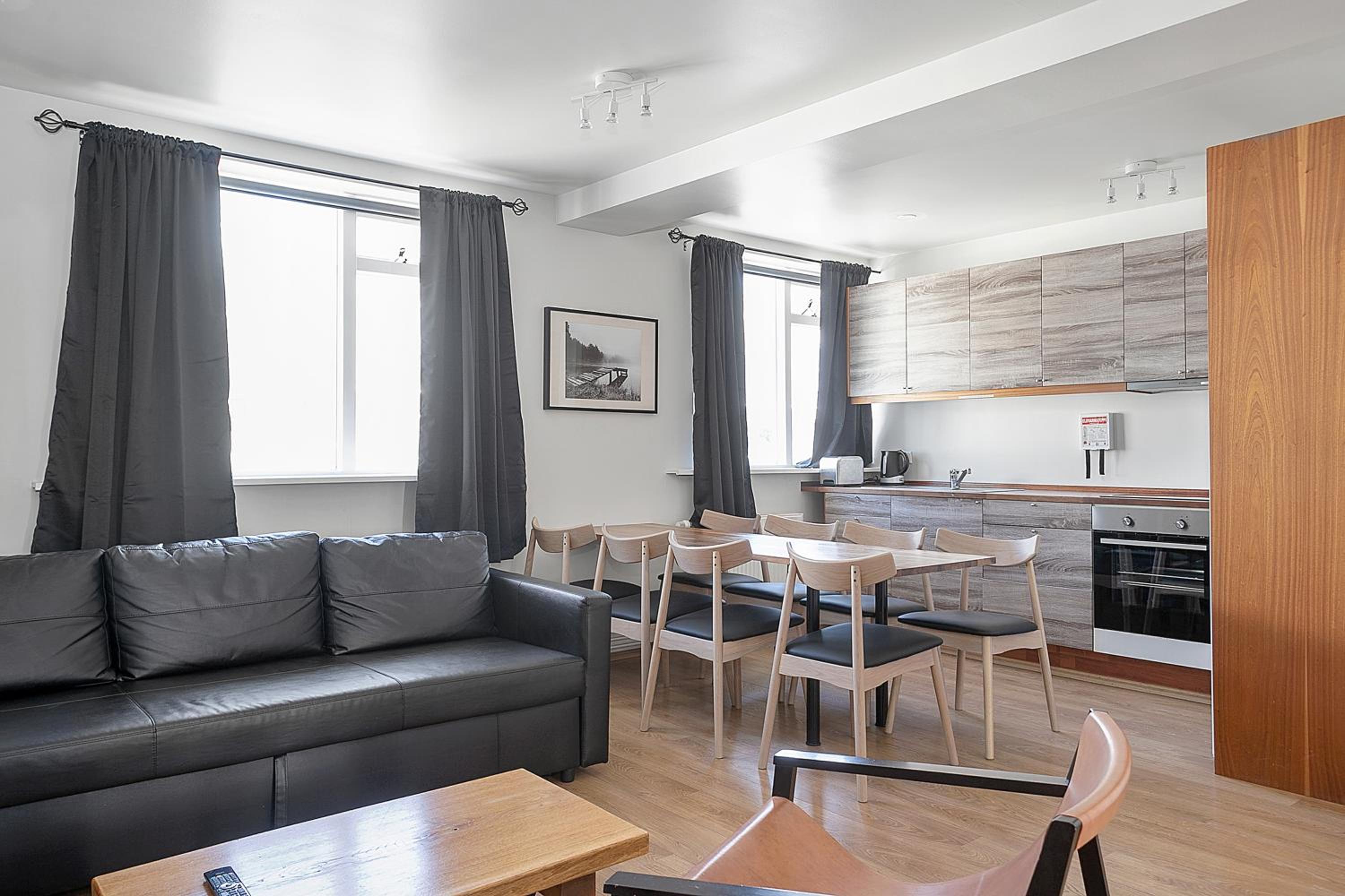 Three-Bedroom Apartment - Photo 2
