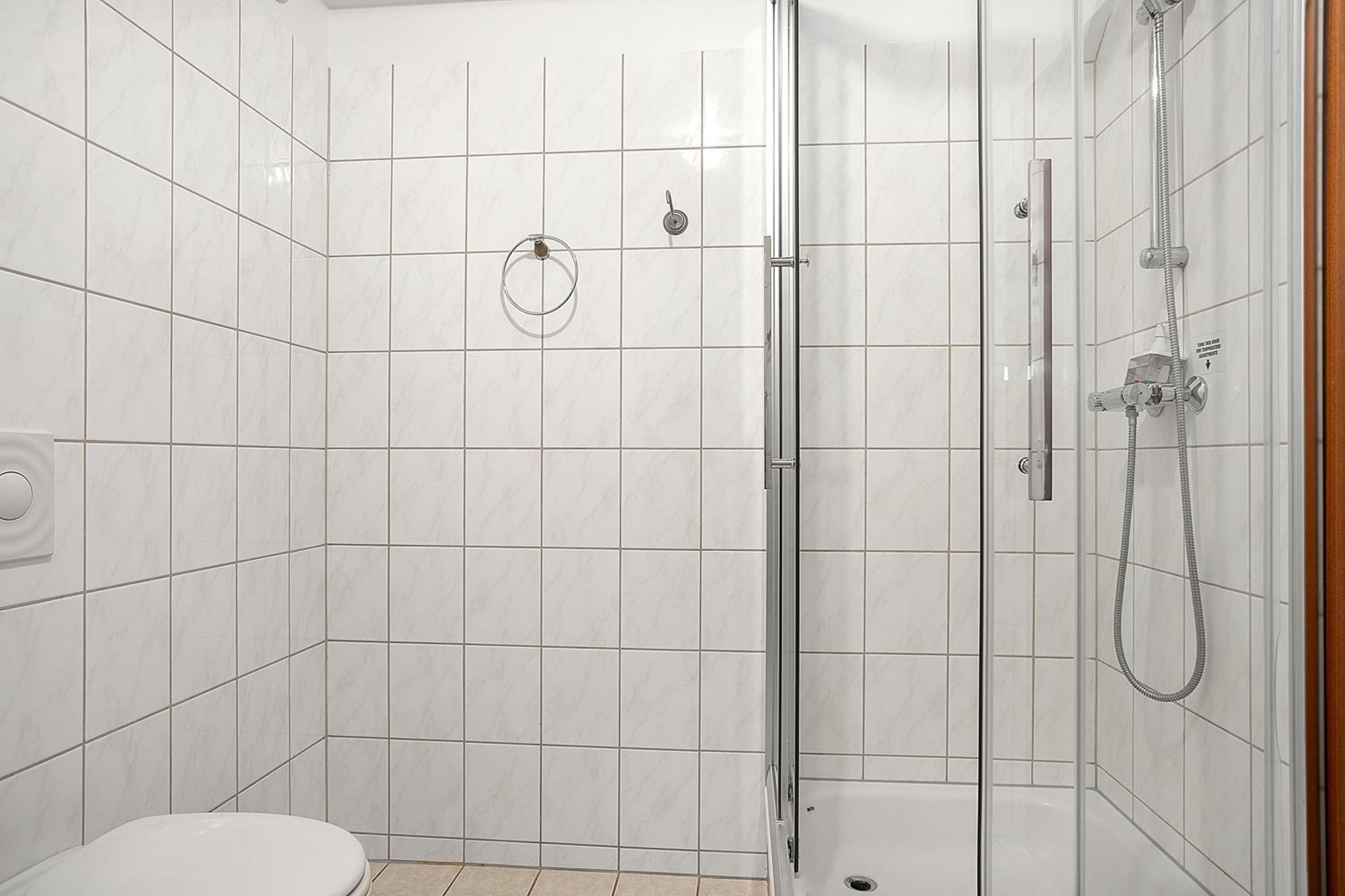 Three-Bedroom Apartment - Photo 11