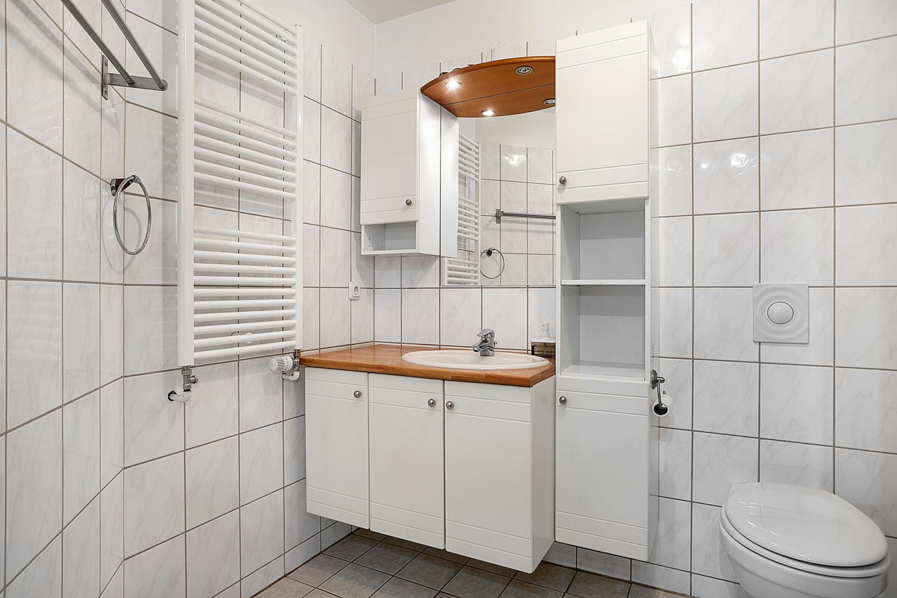 Three-Bedroom Apartment - Photo 10