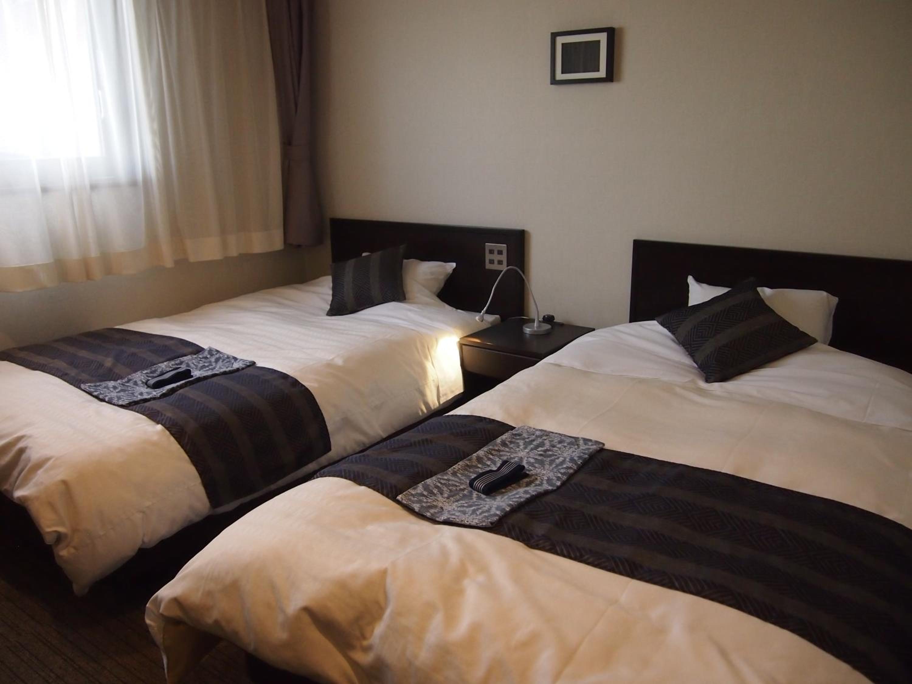 Twin Room - Non-Smoking - Photo 7
