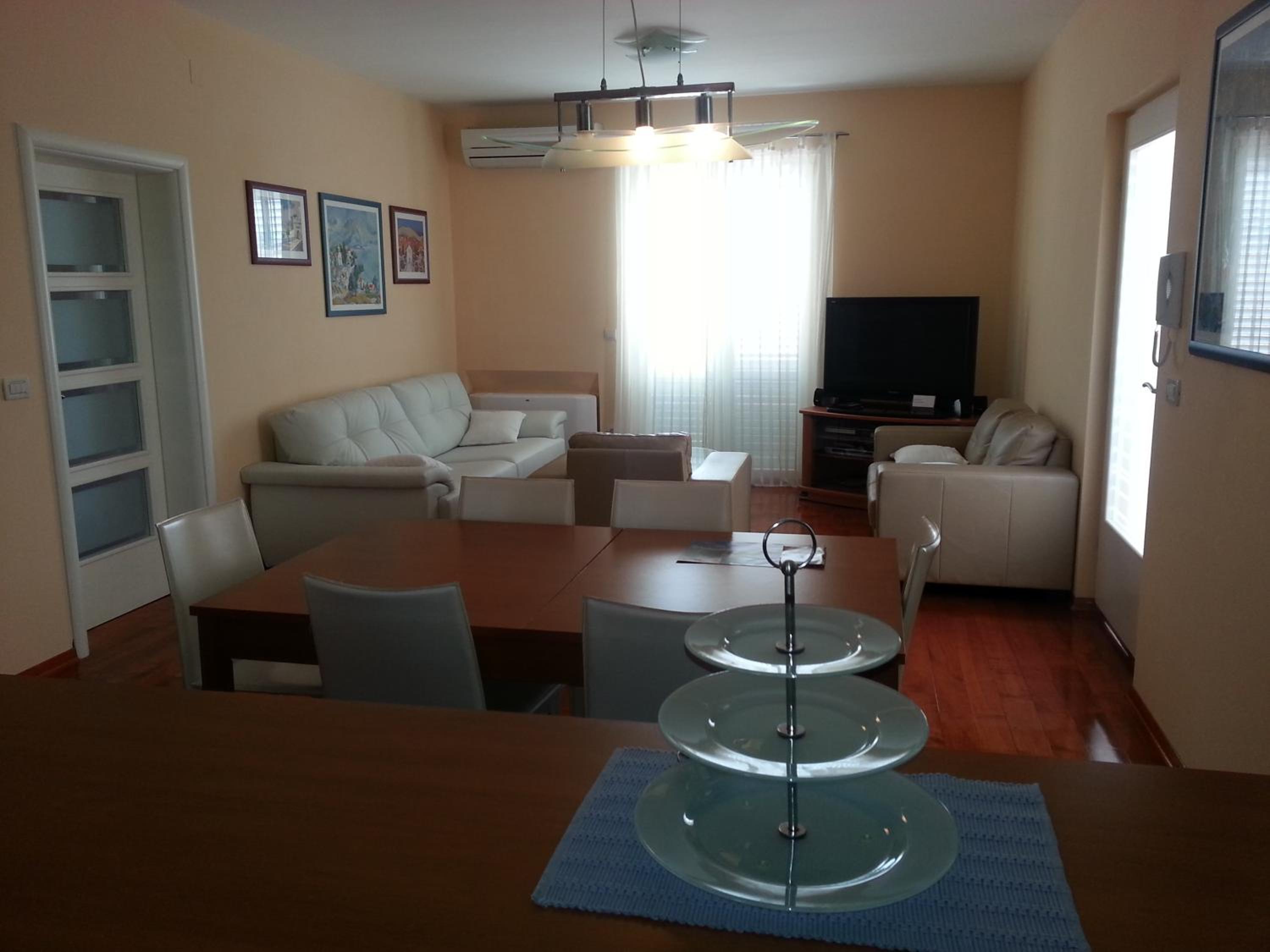 Three-Bedroom Apartment with Balcony - Second floor