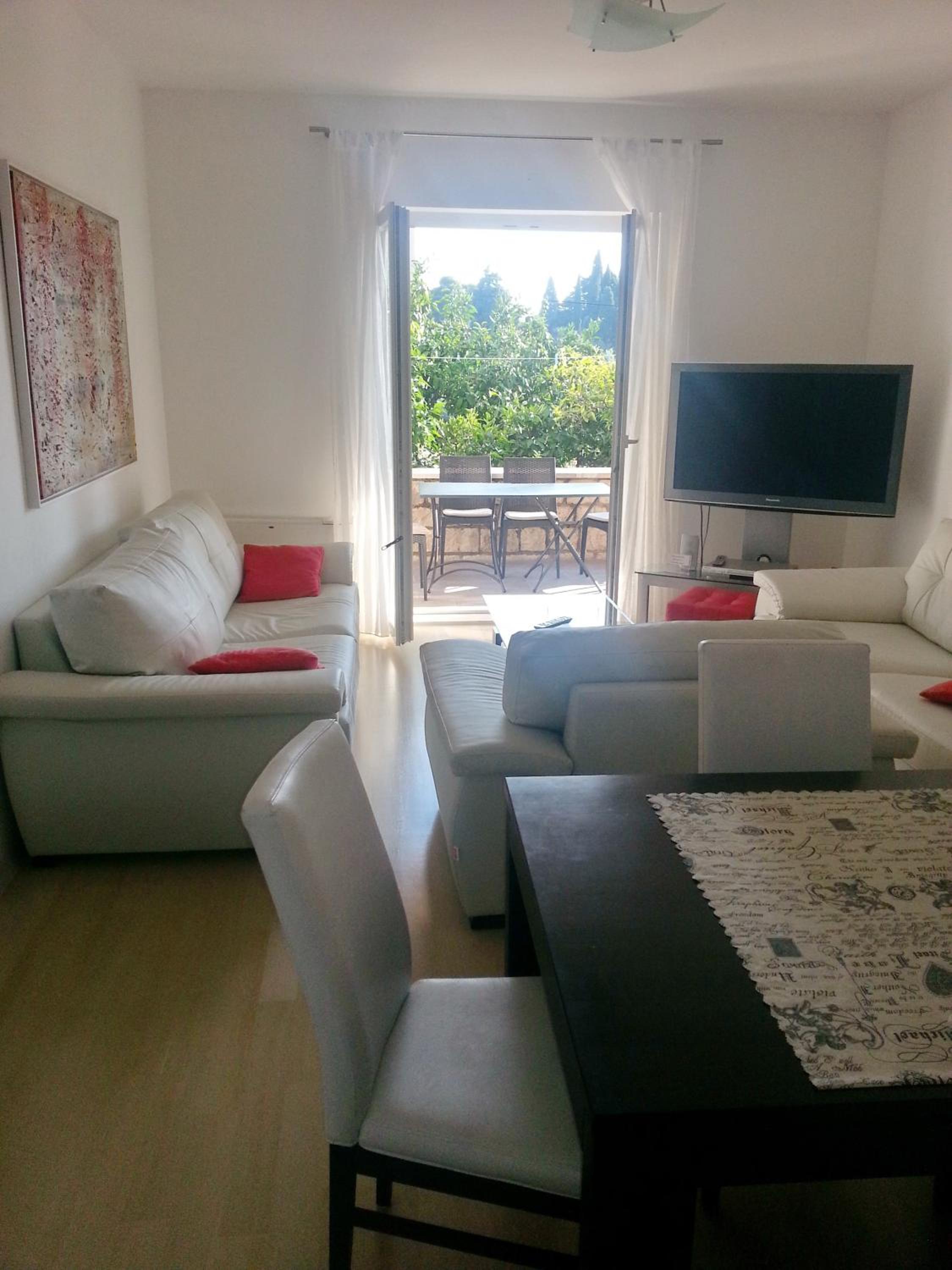 Three-Bedroom Apartment with Terrace and Balcony