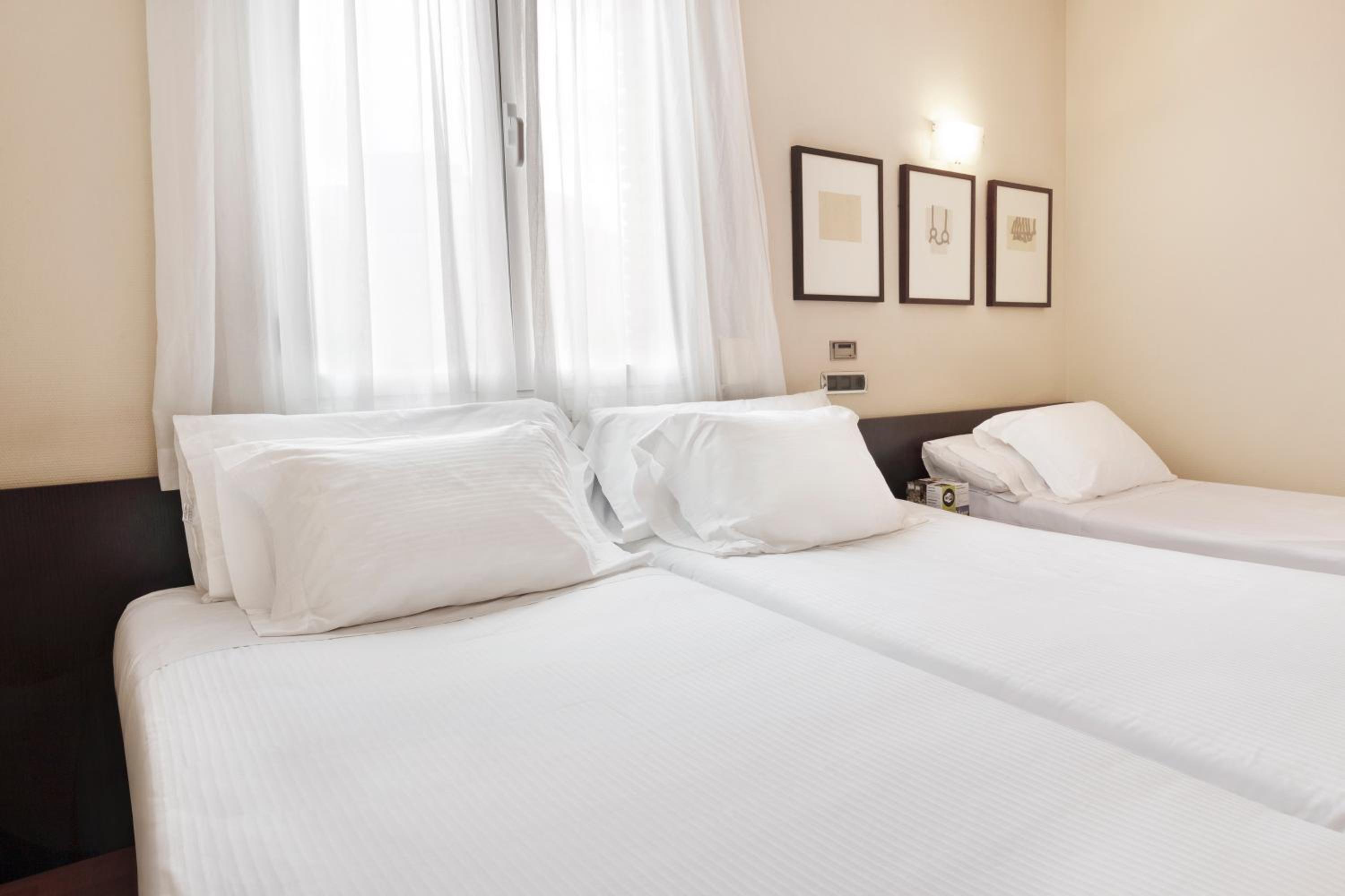 Habitación Doble o con Dos Camas con Cama Extra (2 Adultos + 1 Niño)