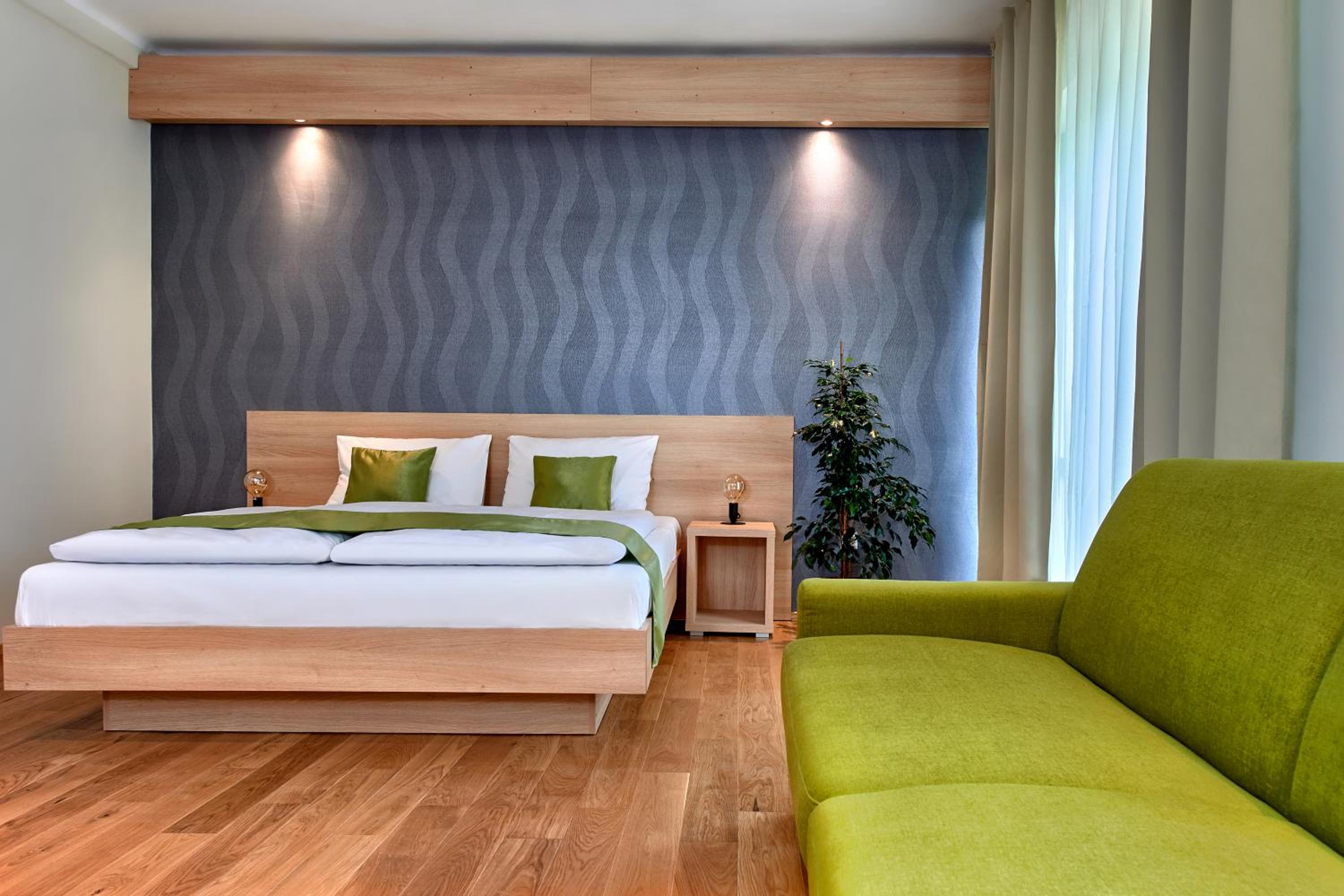 Quadruple Room with Balcony - Photo 1