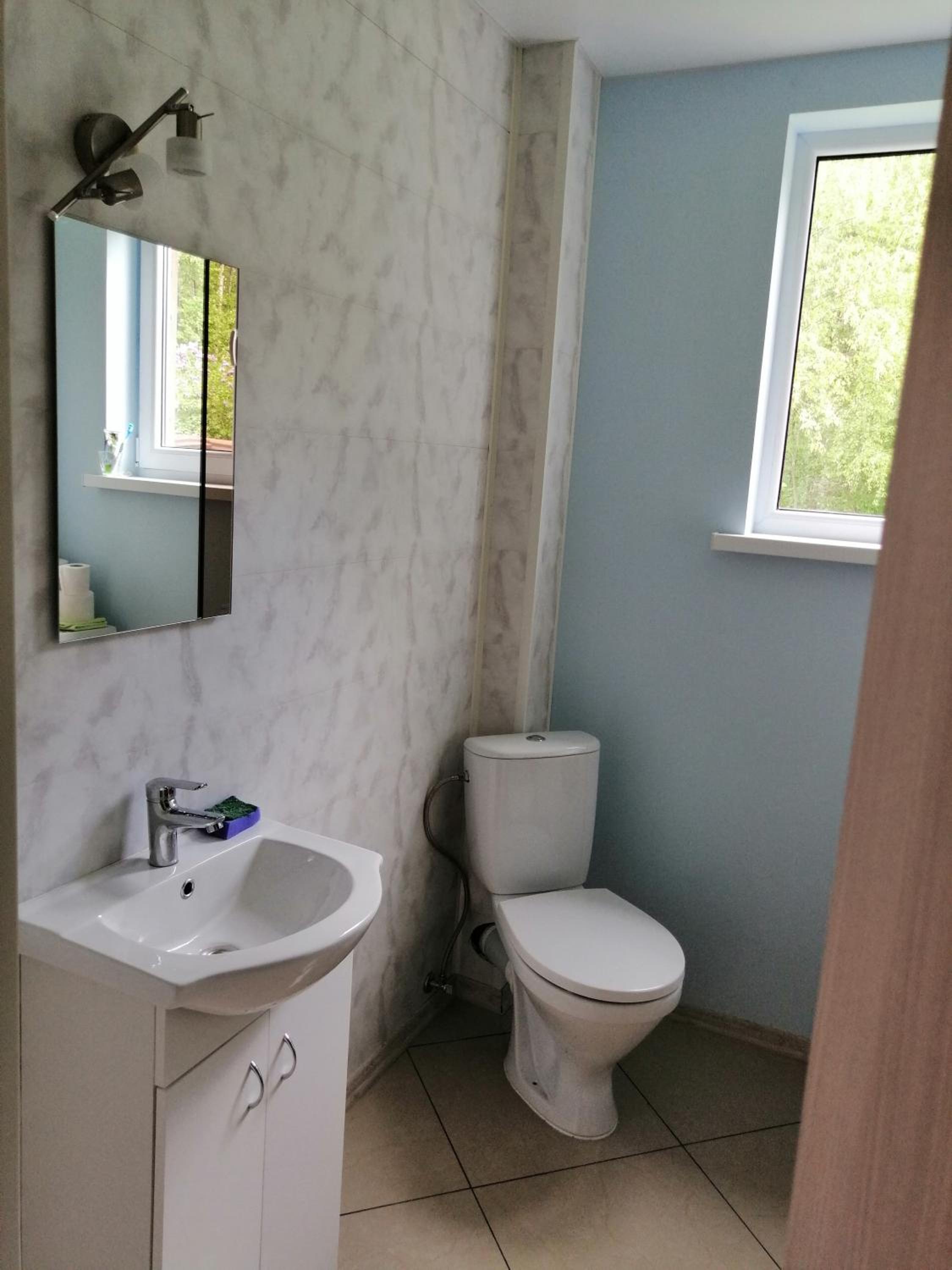 Three-Bedroom House - Photo 24