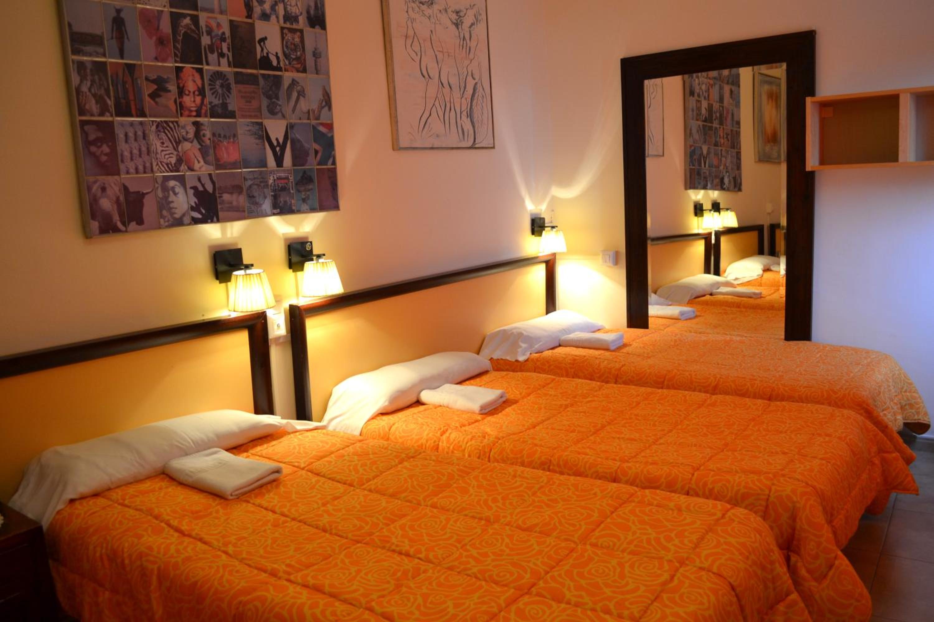 Habitación Doble con Cama Extra (3 Adultos) con Baño