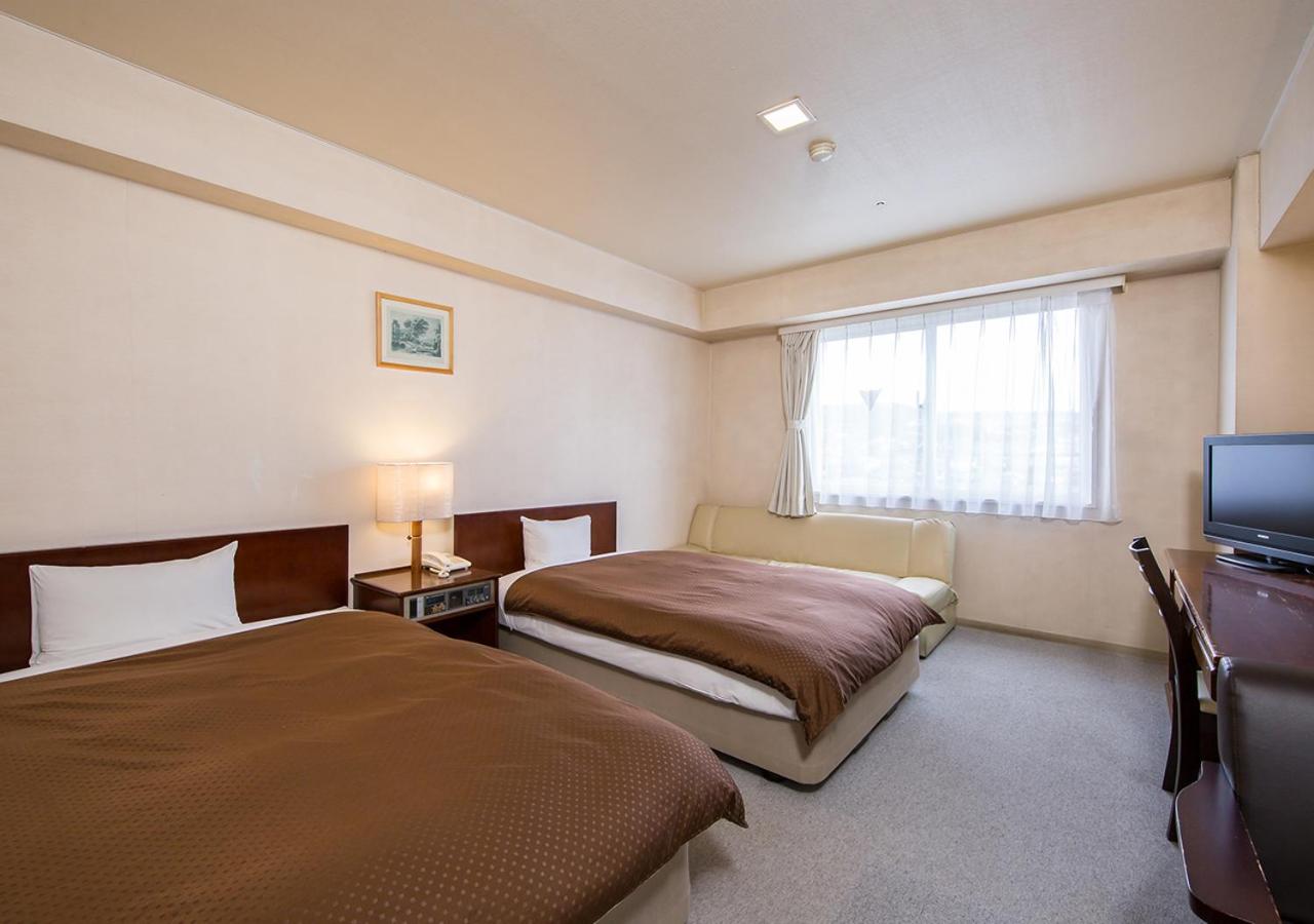  Twin Room - Non-Smoking - Photo 1