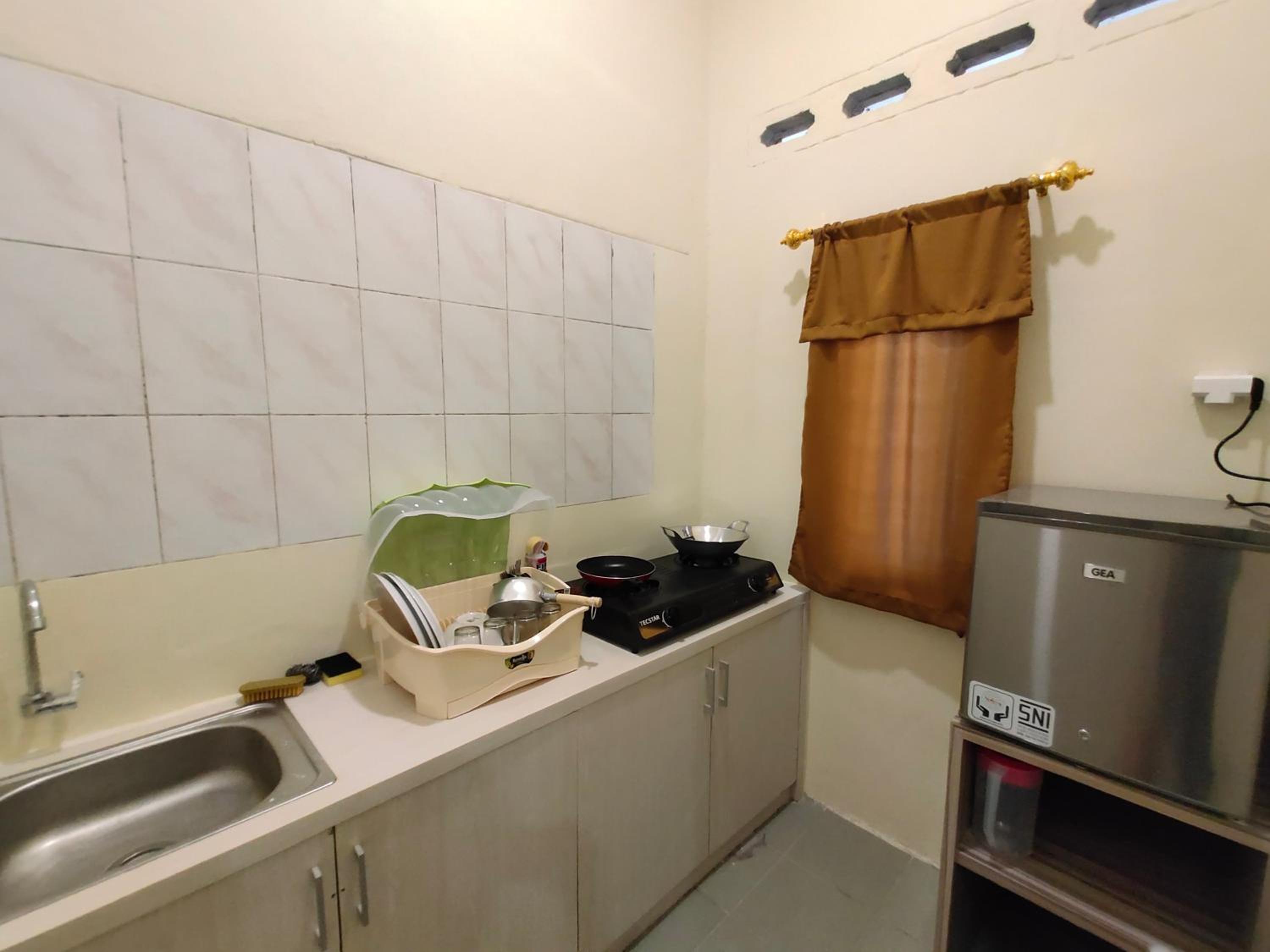 Three-Bedroom House photo 3