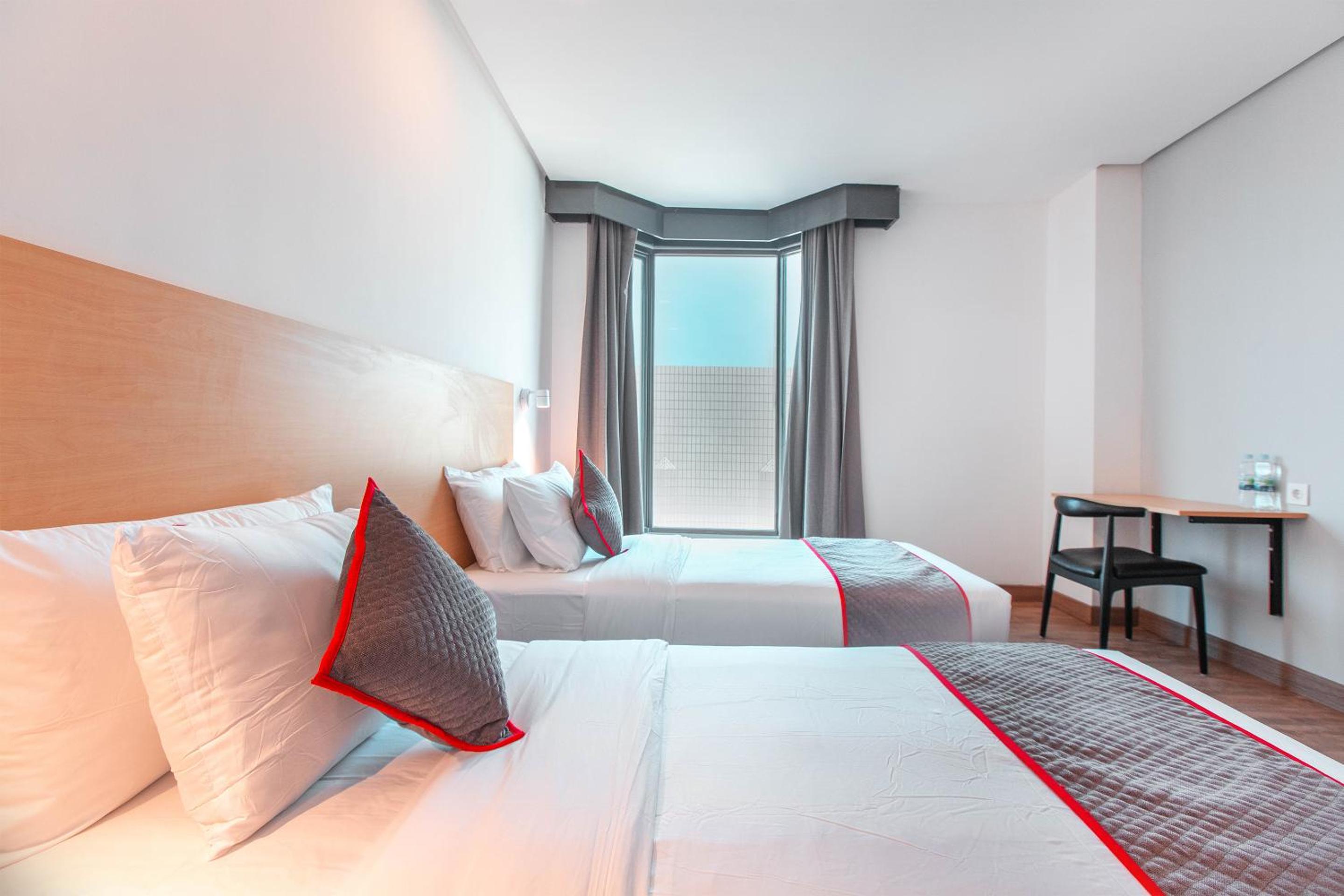 Delxue Twin Room - Photo 1