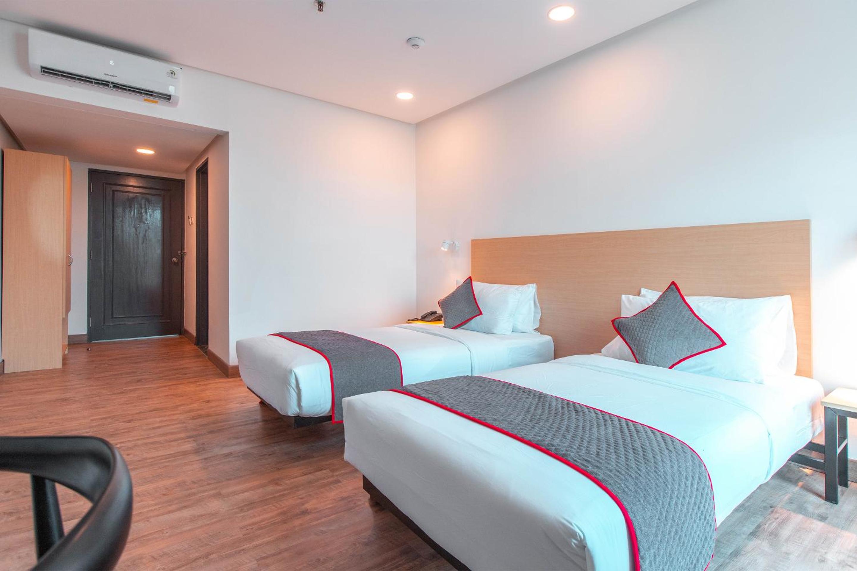 Delxue Twin Room - Photo 3