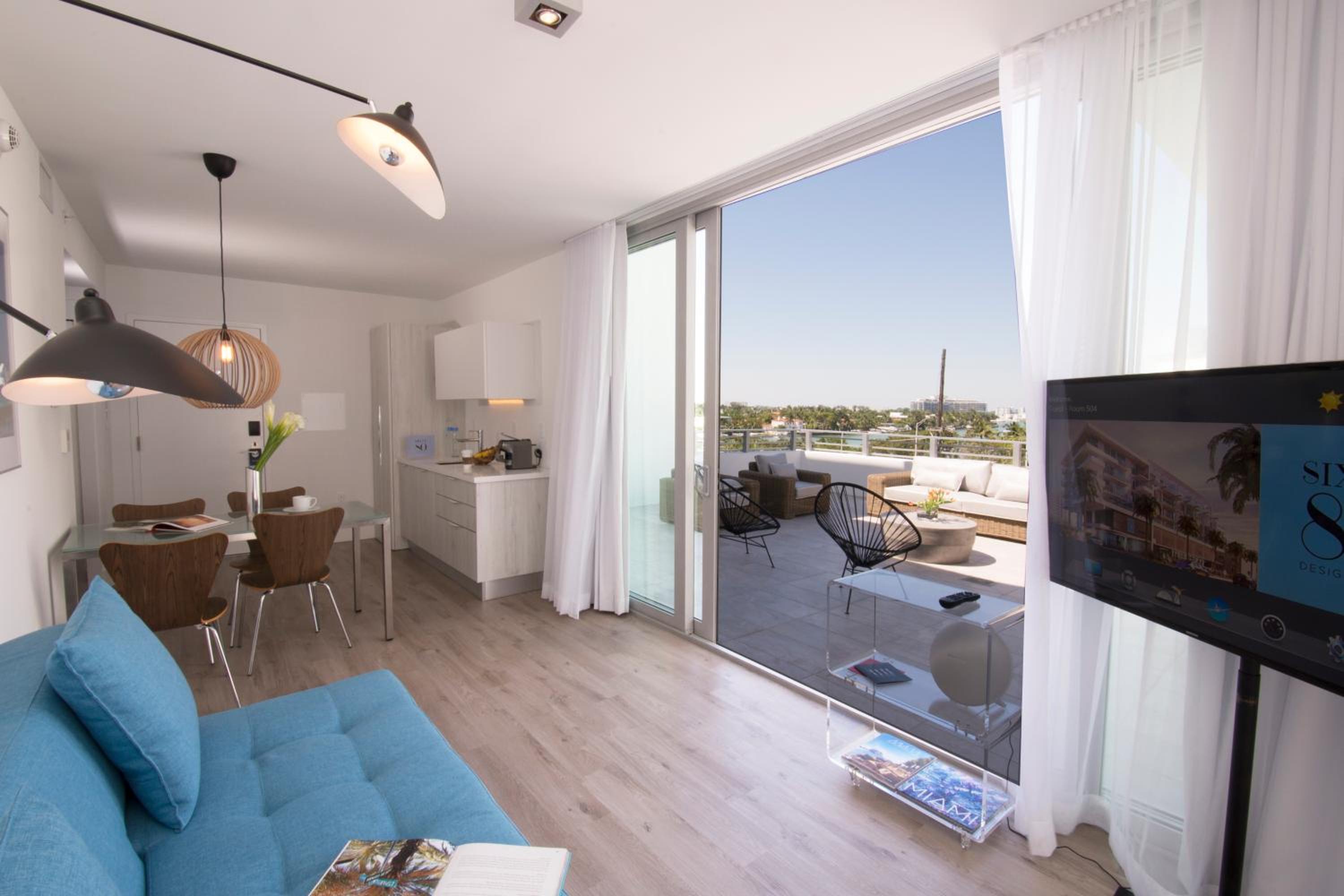 One Bedroom Corner Suite with Kitchenette and Spacious Terrace