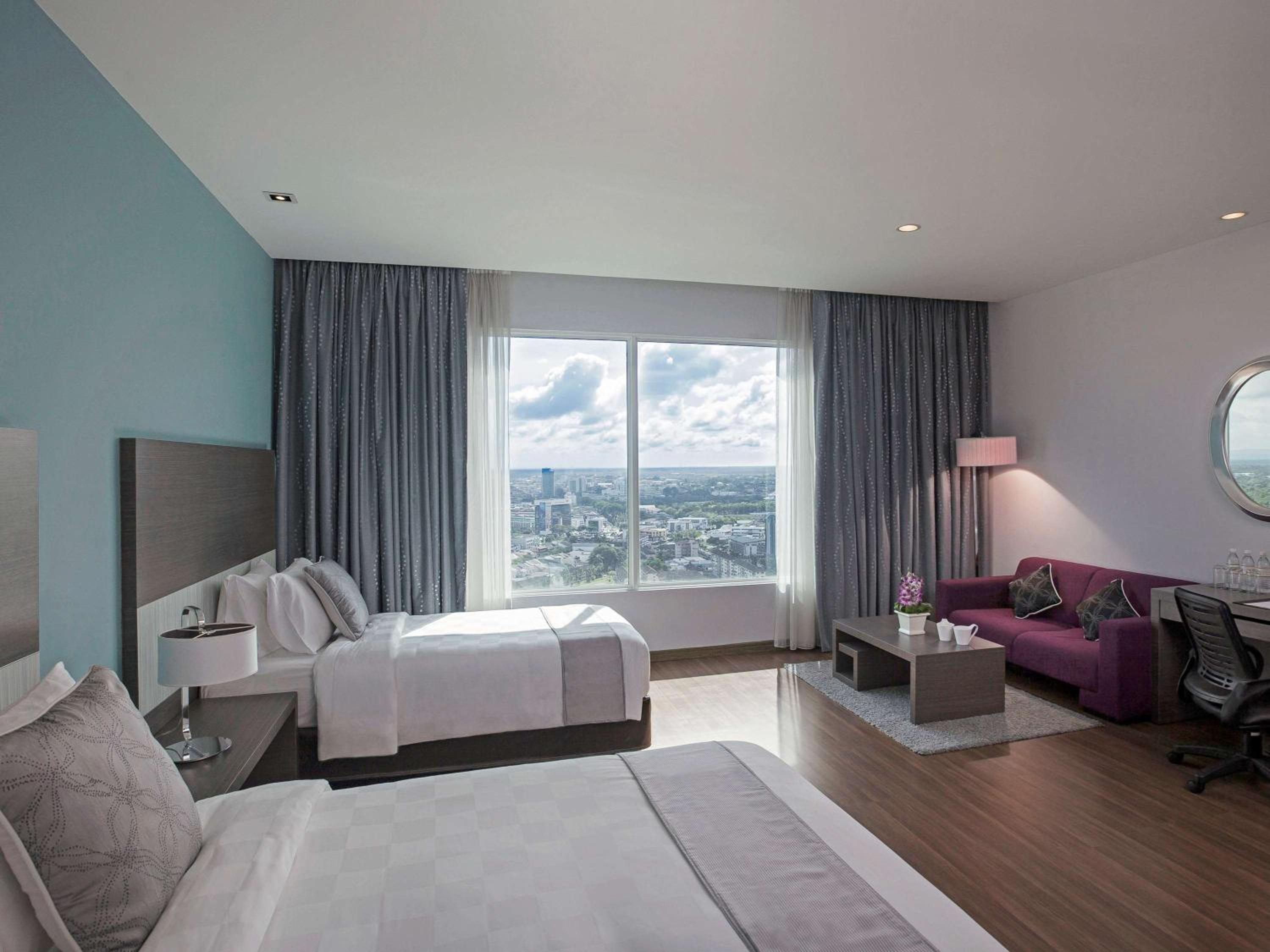Family Room with One King Bed and One Single Bed - Photo 1
