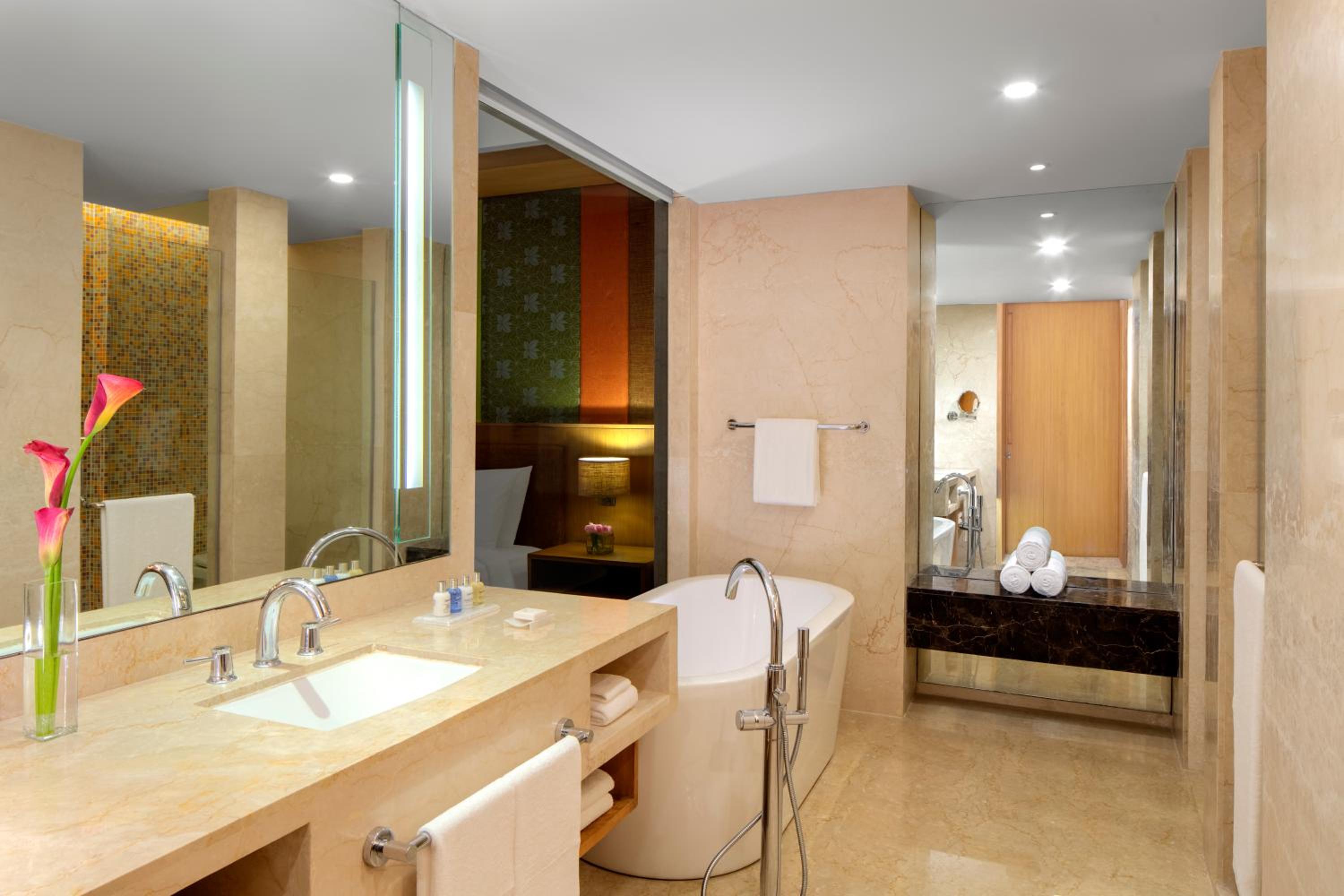 Junior Suite with King Bed with Bath tub , Lake View , Lounge Access ,Complimentary One Way Airport Transfer, 2 Pcs Complimentary Laundry , 15% off on Food & Soft Beverages and Pick up and drop from Kamakhya Temple