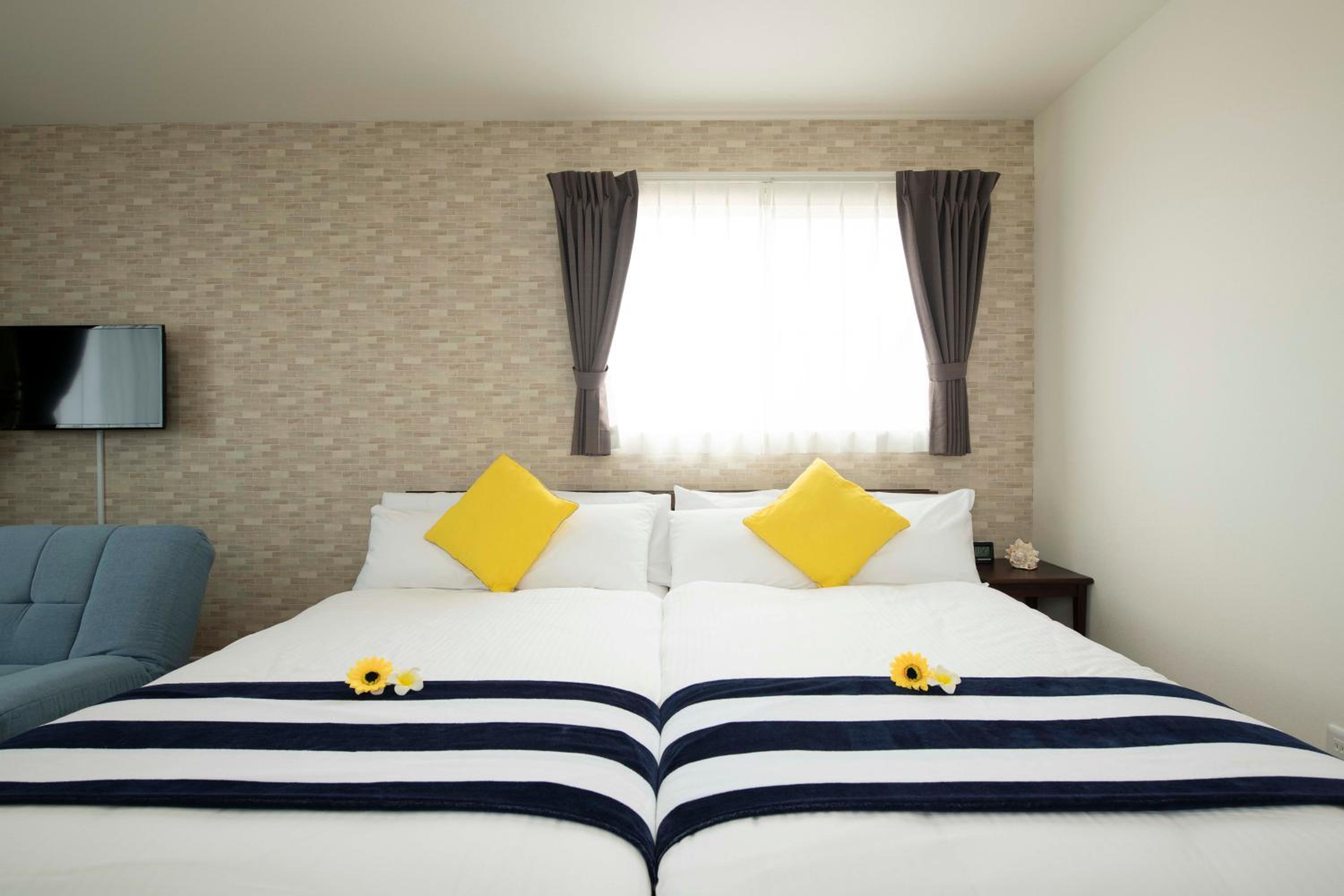 Deluxe Quadruple Room - Photo 12
