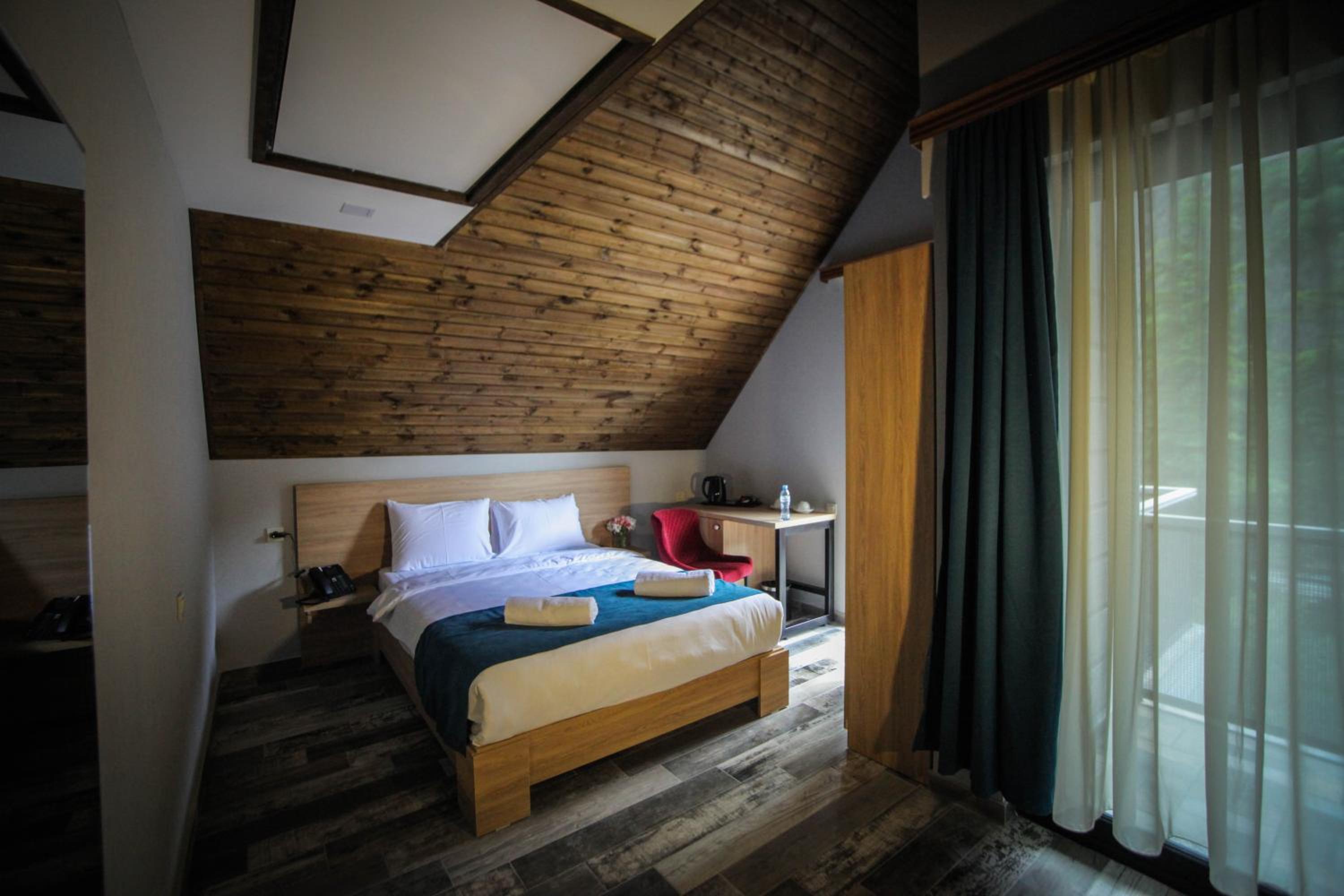 Quadruple Room with Balcony - Photo 24
