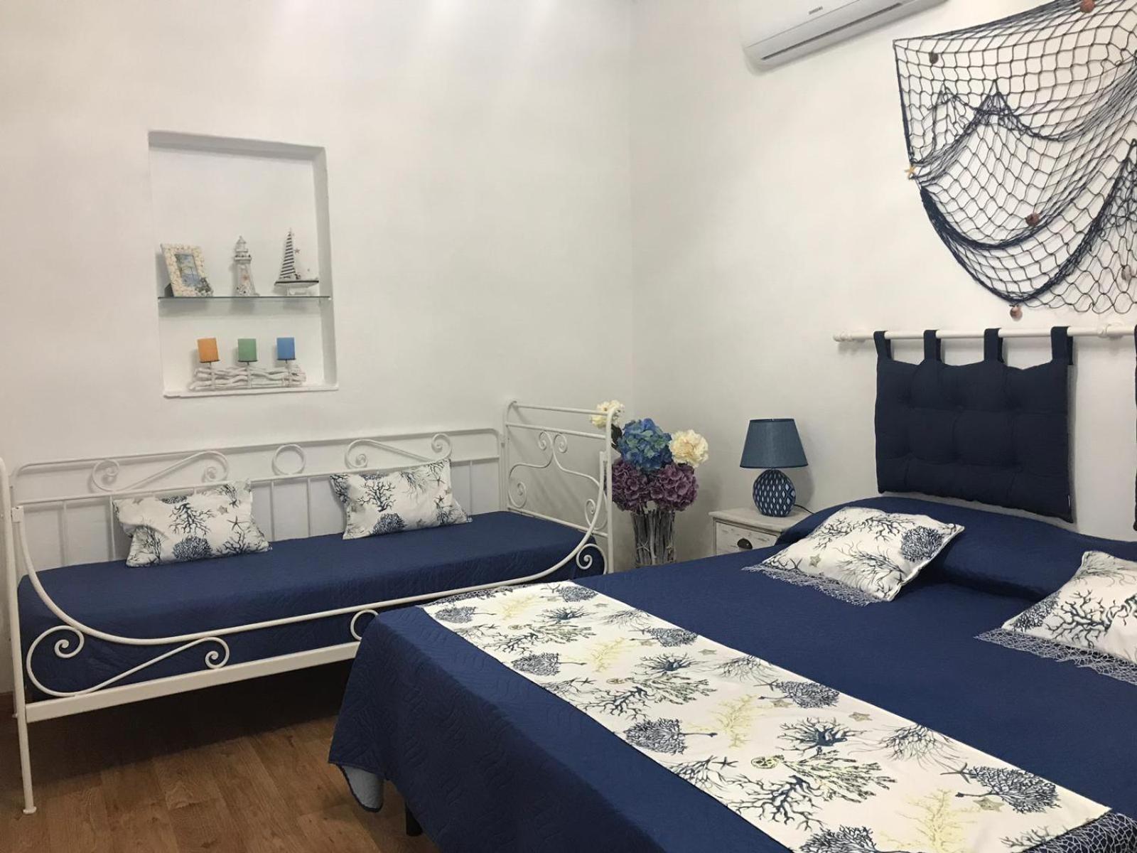 Quadruple Room - Photo 21